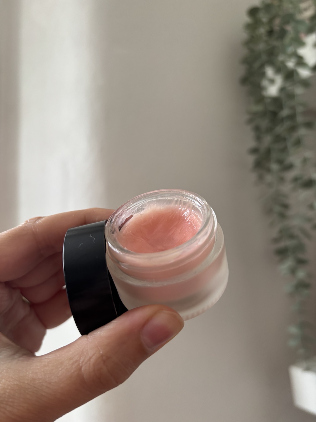 Mica Ricketts holding Mecca Cosmetica Lip De-Luscious SPF20