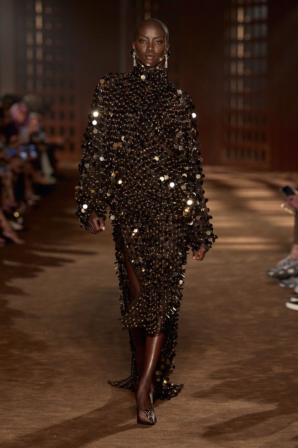a model walks the ferragamo spring 2027 runway.