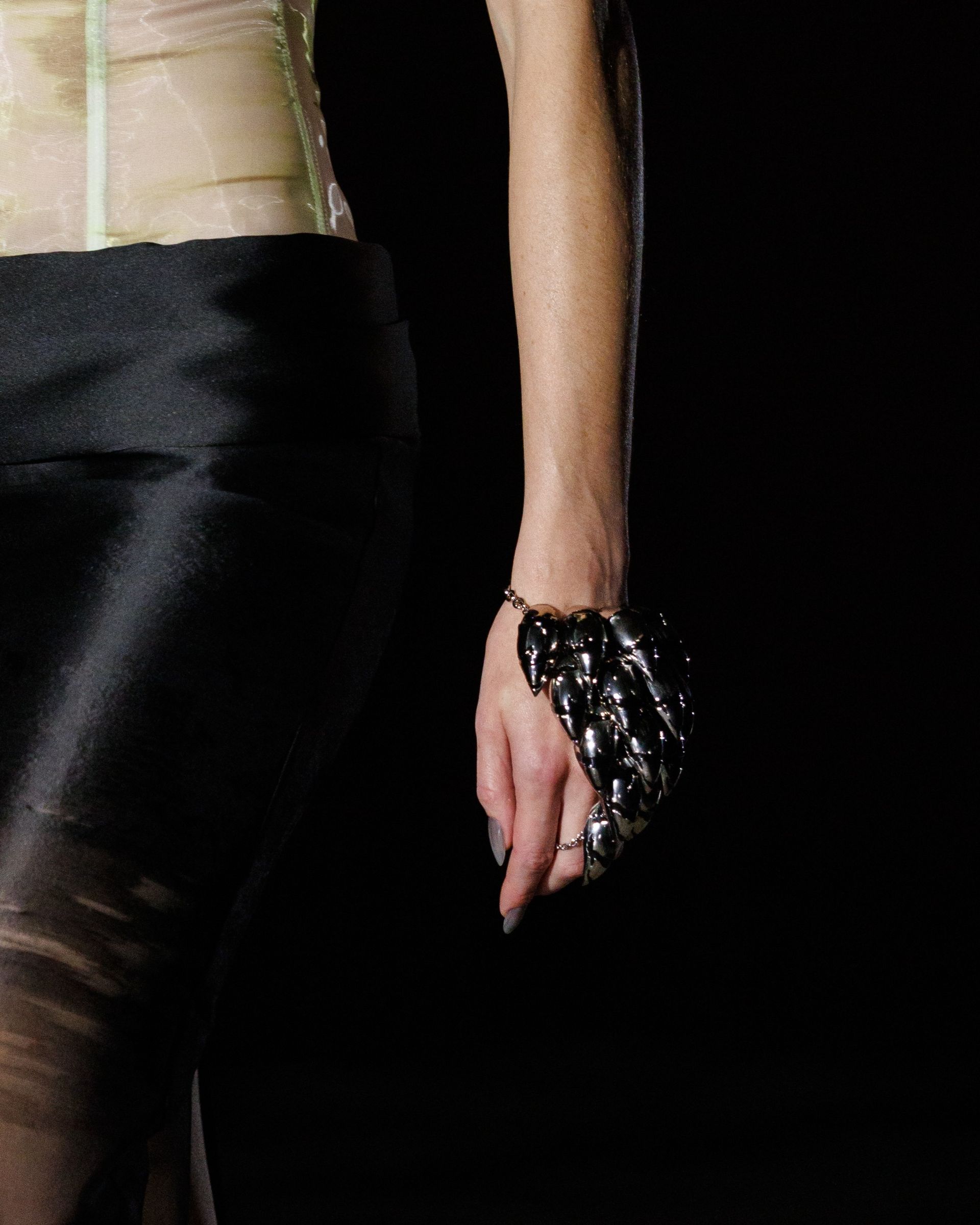 Photo of model walking in the Alexander McQueen Spring Summer 2027 show.