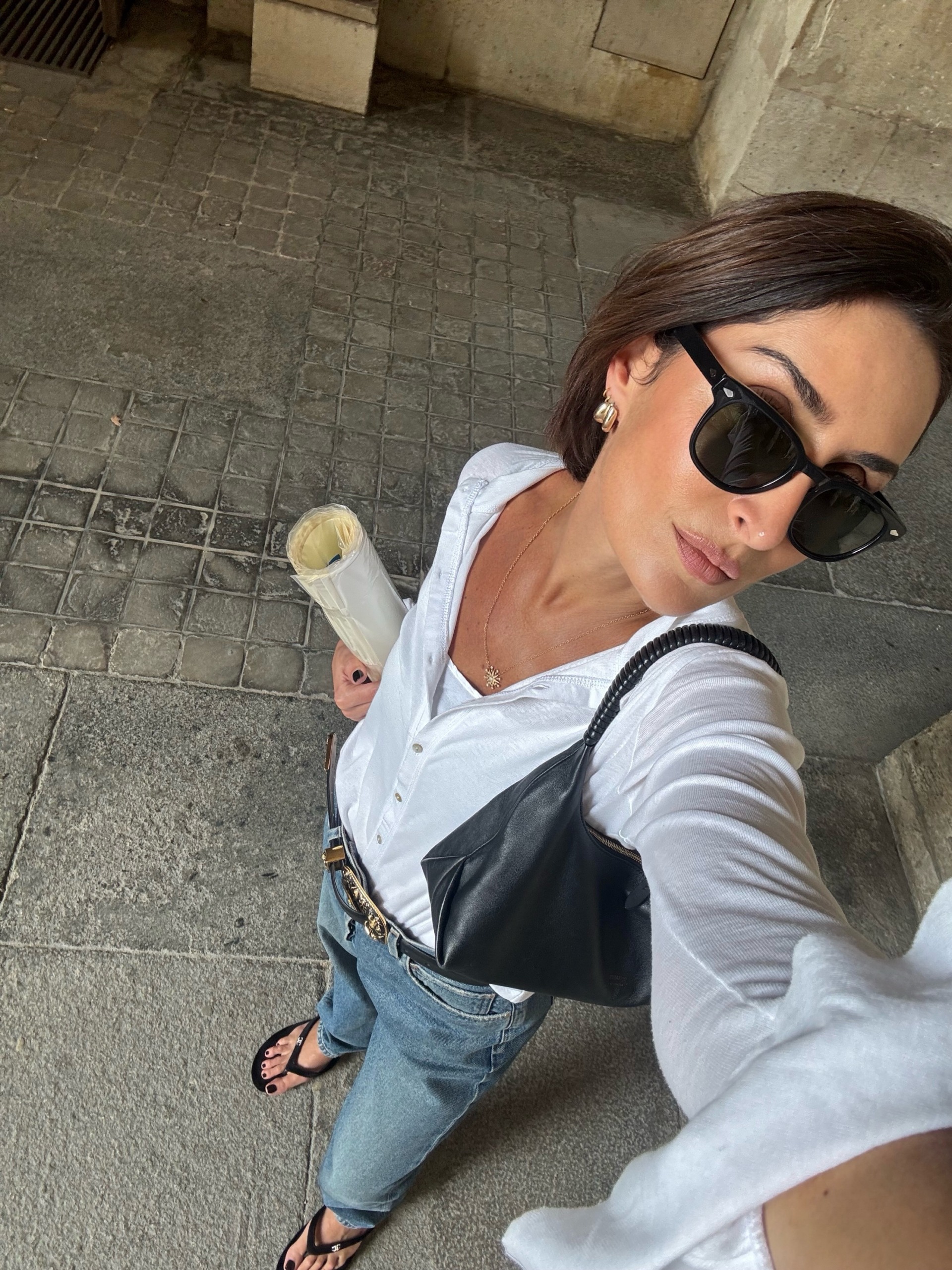 Woman in Paris wearing a fall outfit idea.