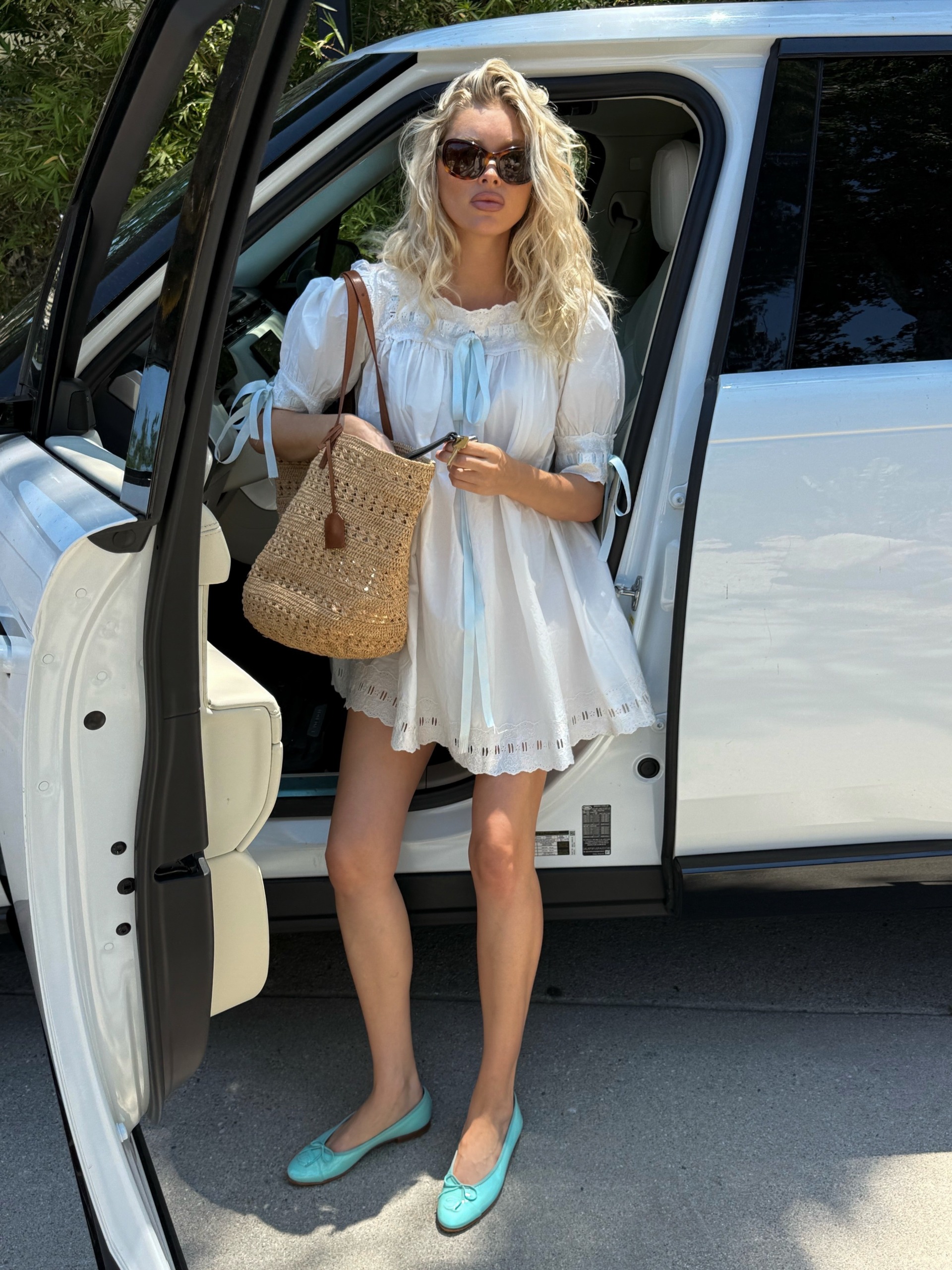 Influencer wearing babydoll dress.