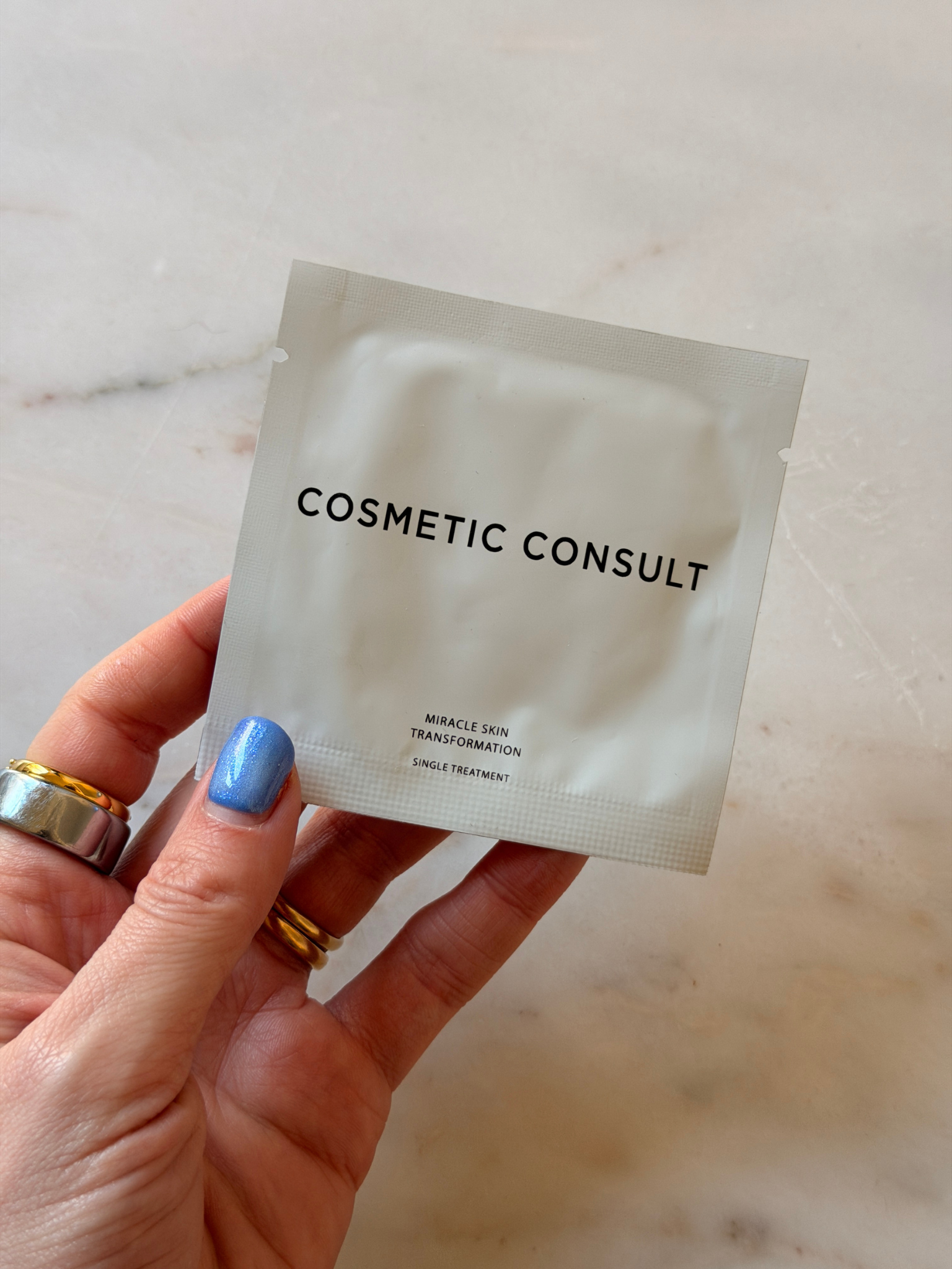 Freelance beauty editor Grace Day holding Cosmetic Consult Miracle Skin Transformation