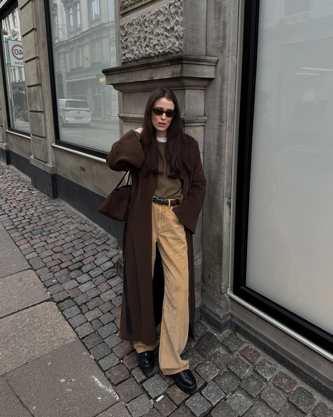 Annabel wearing brown jumper