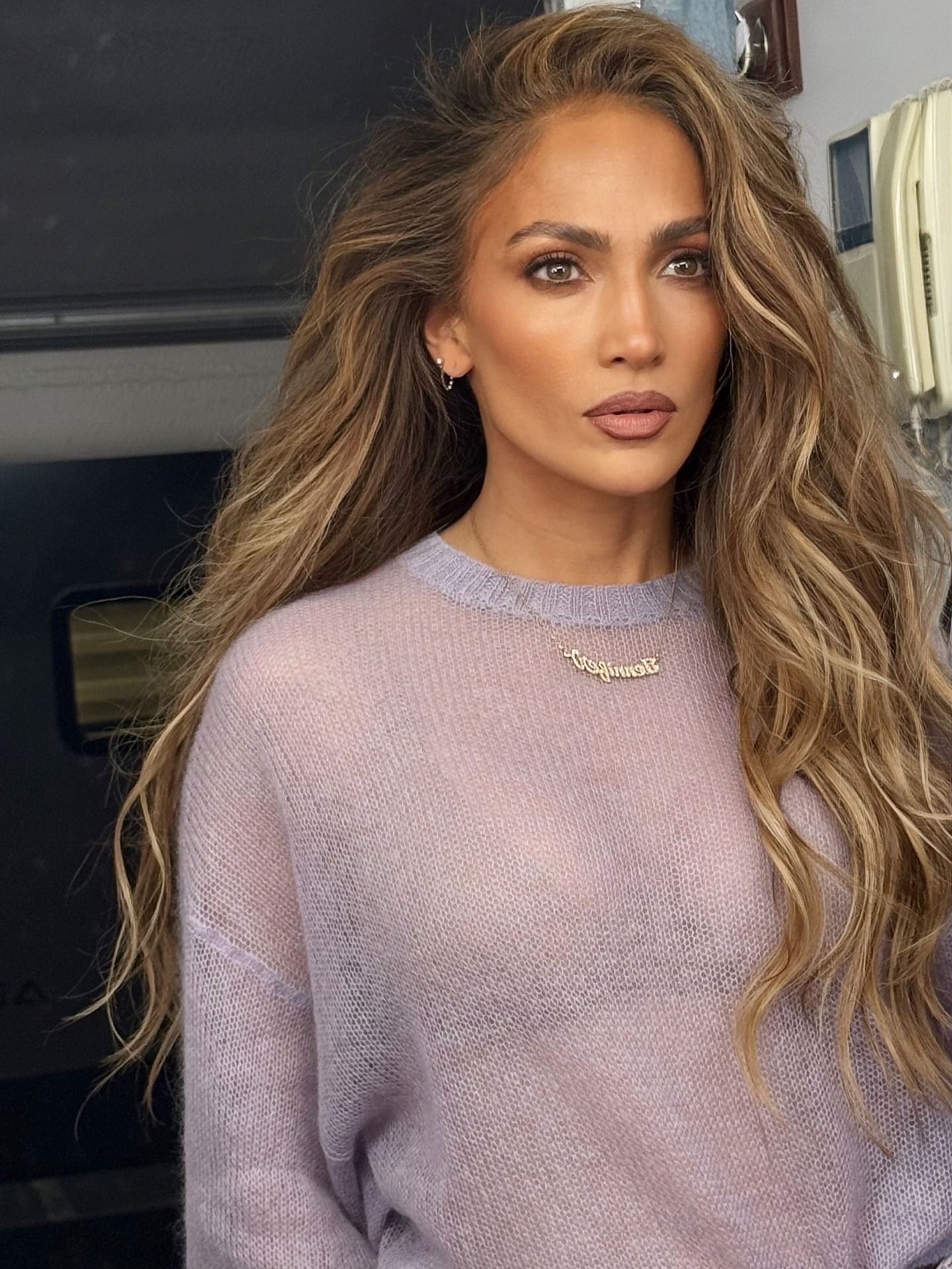 Jennifer Lopez with warm blonde highlights