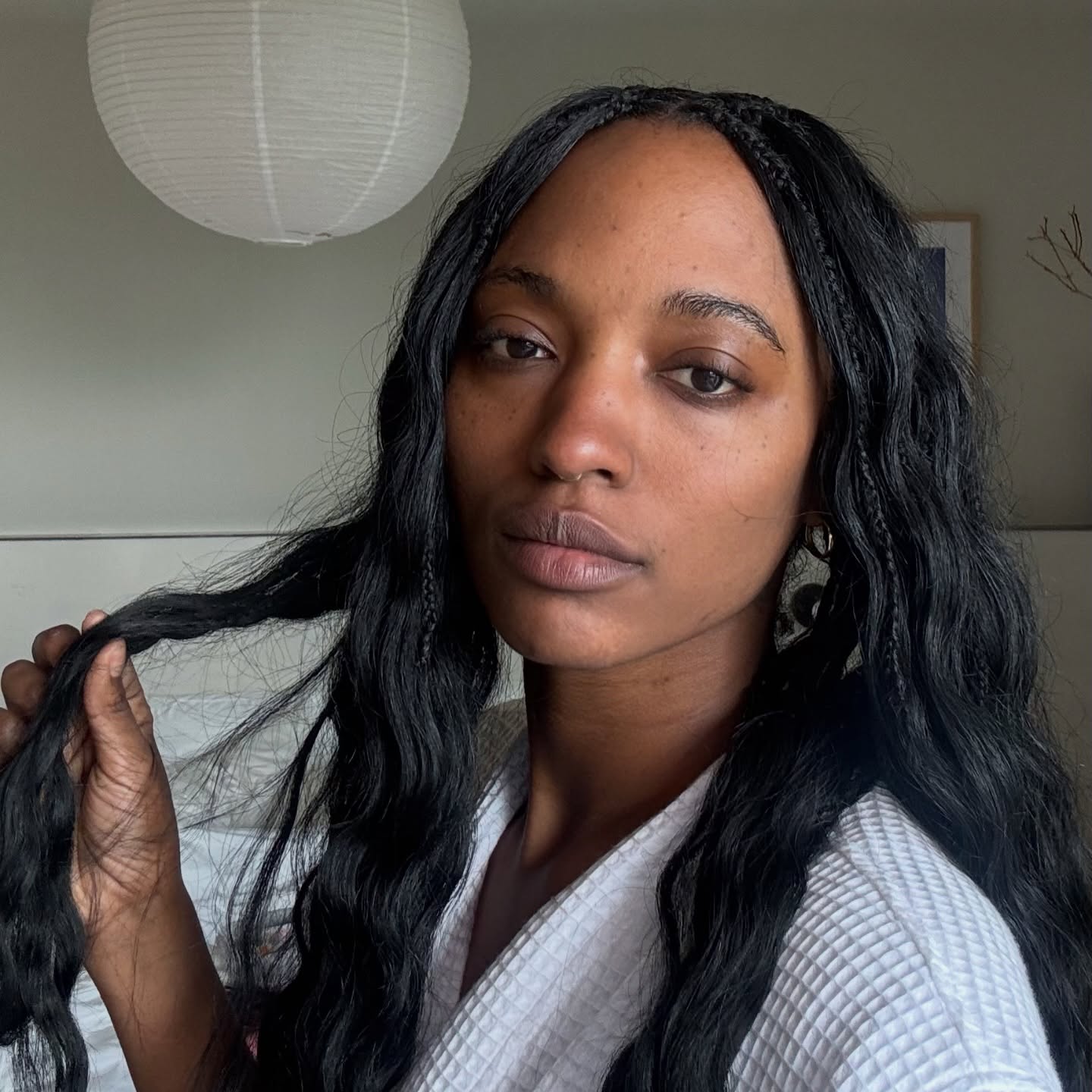 A woman with shiny waves.