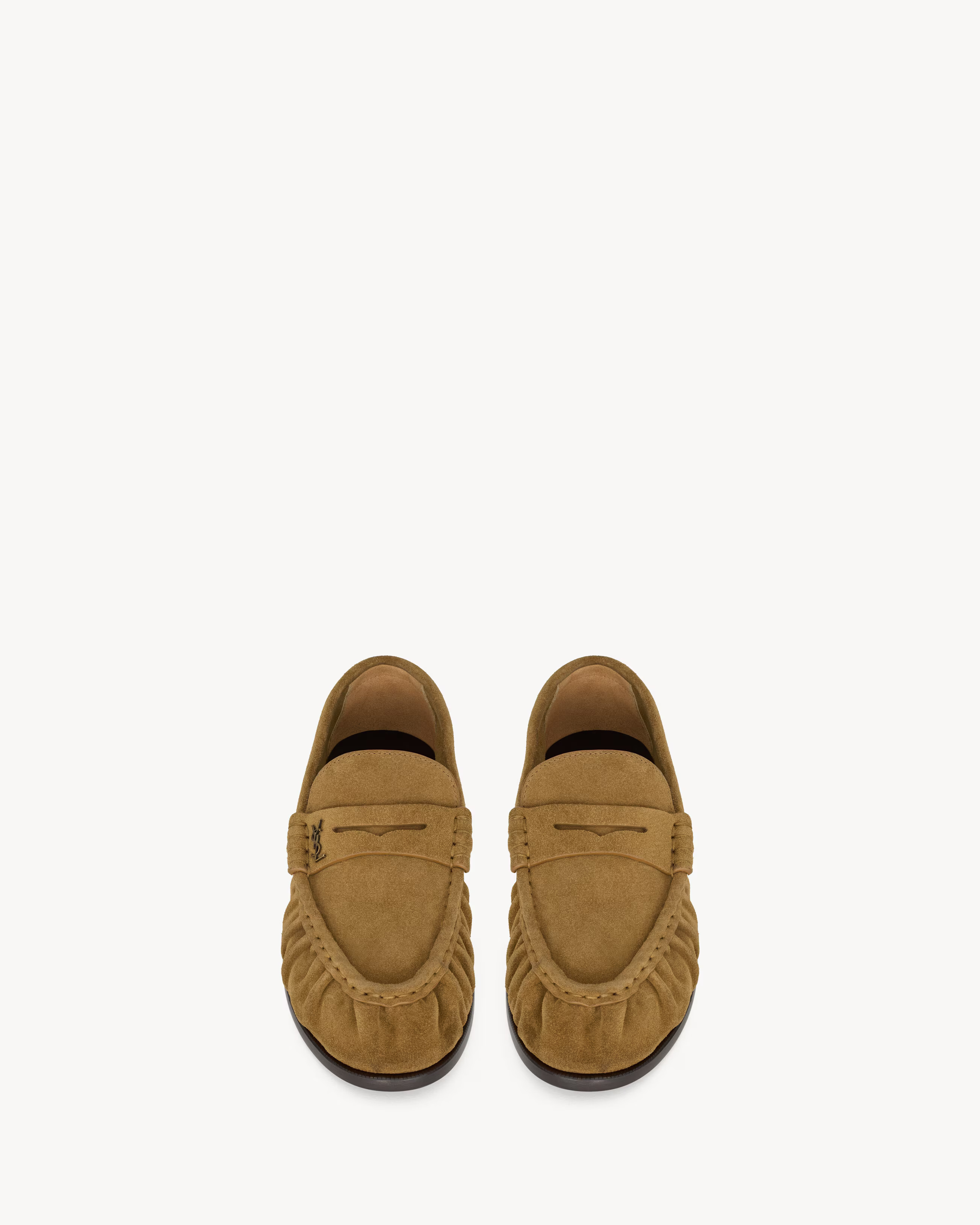 An image of YSL's suede loafers with gathered material around the toe and vamp.