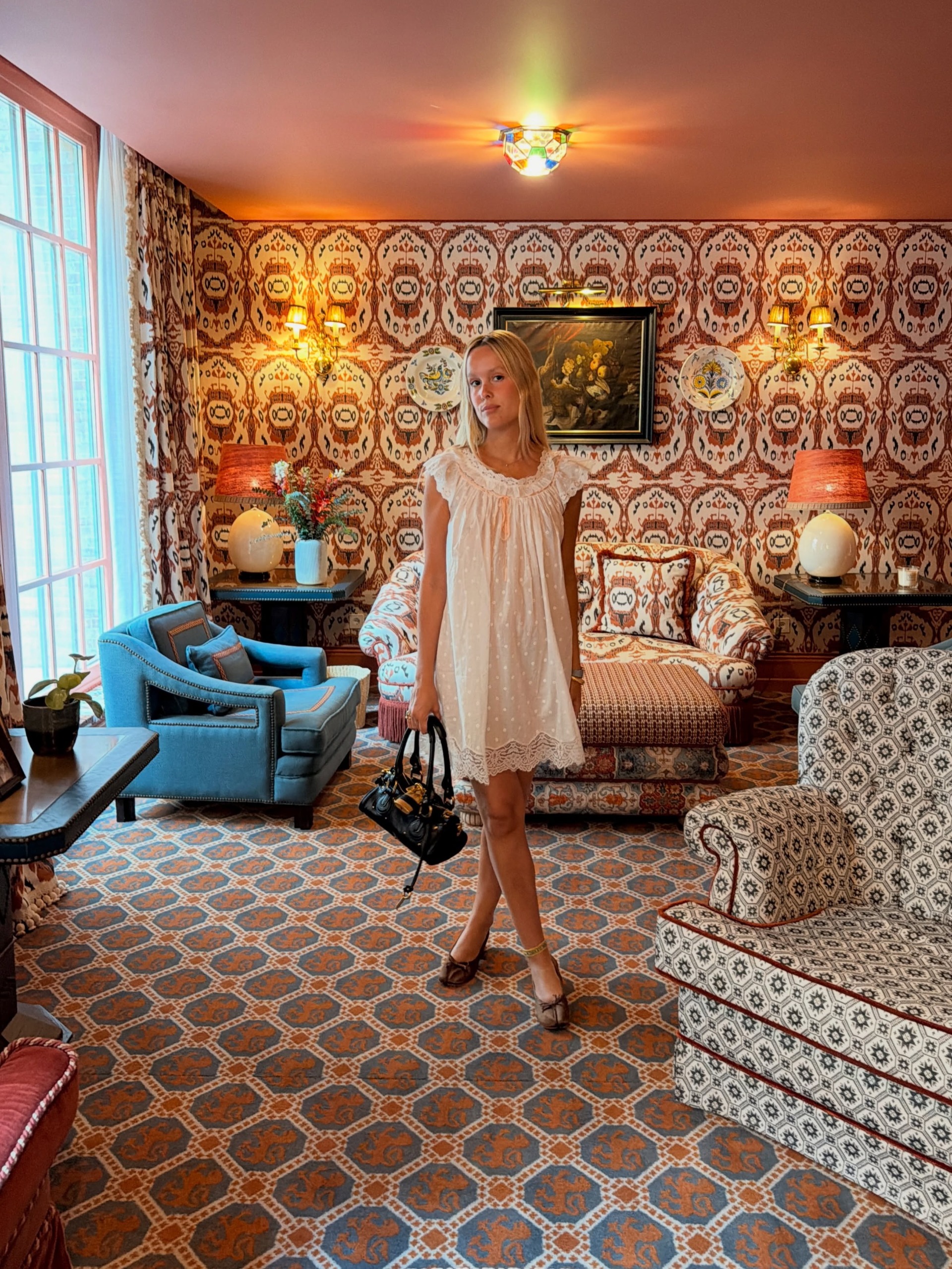 Influencer wearing babydoll dress.
