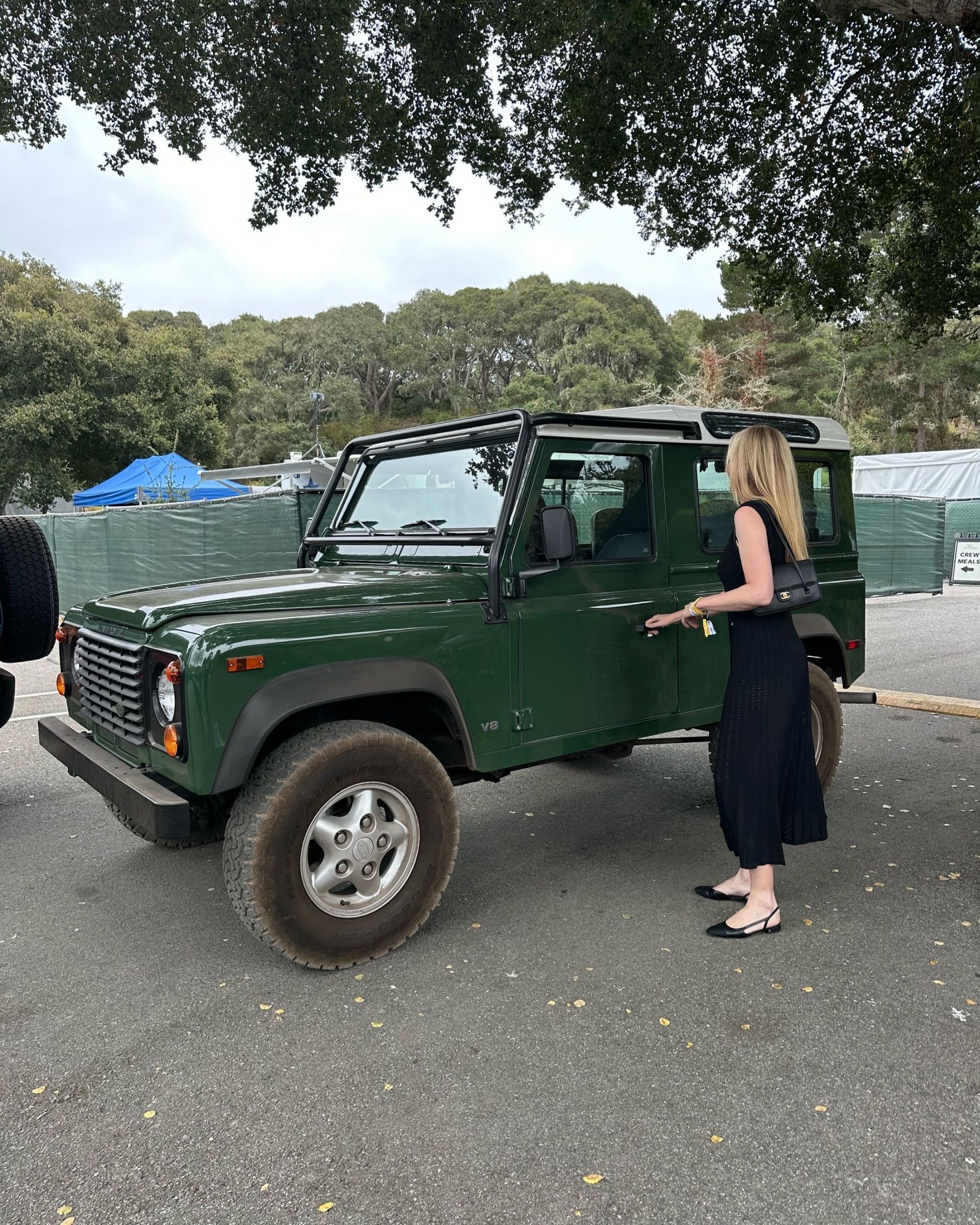 Woman attending Monterey Car Week.