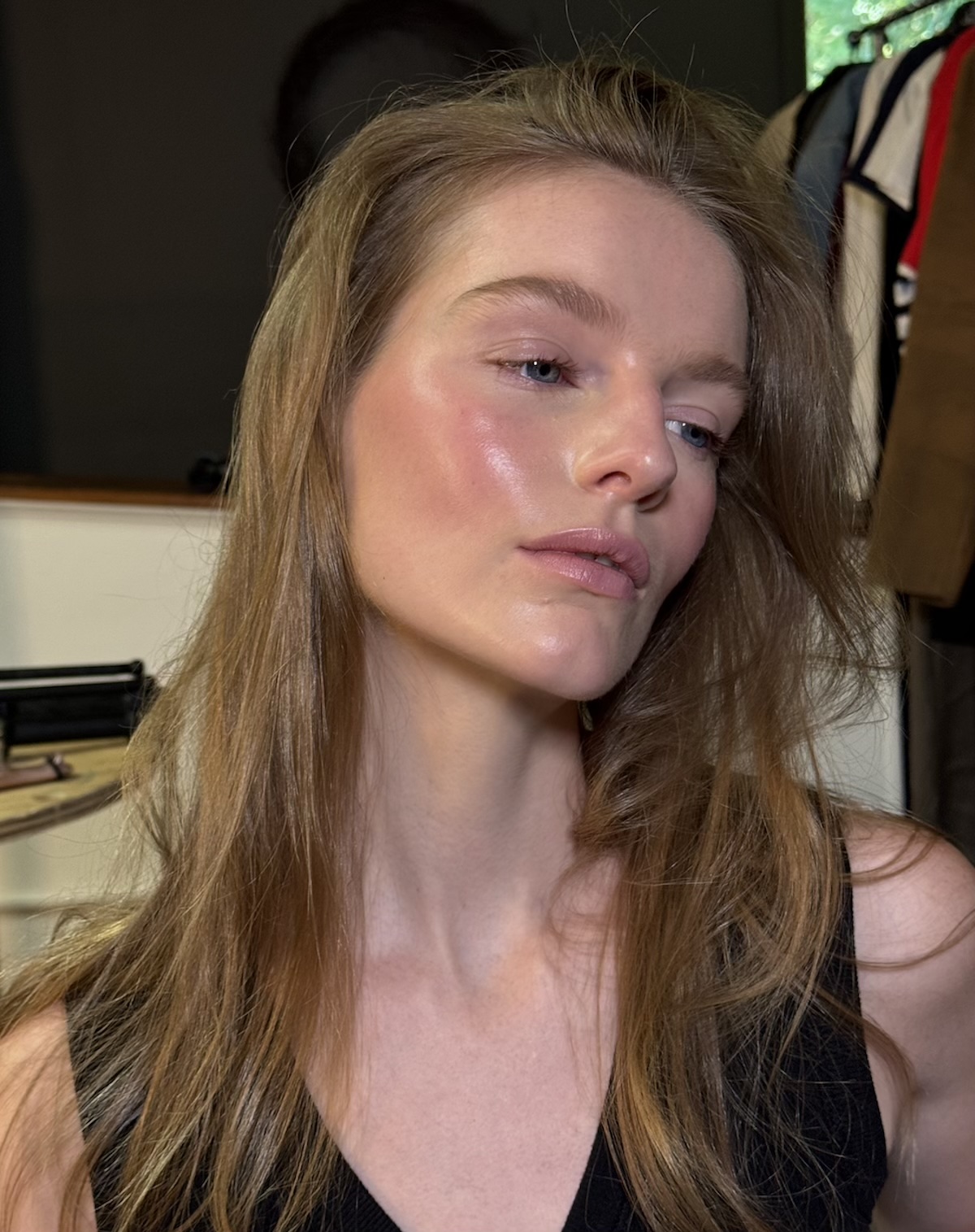 Woman wearing water-splashed blush.