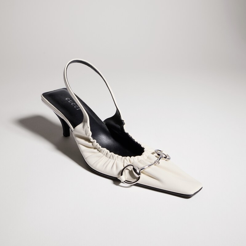 An image of Gucci's Vittoria slingback pump with elastic in white