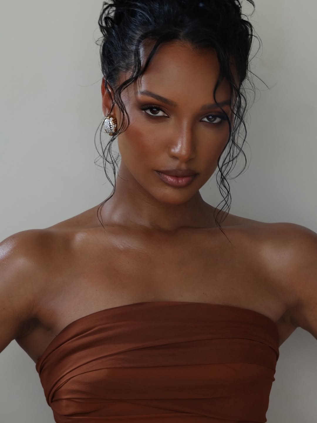 Jasmine Tookes with an updo hairstyle