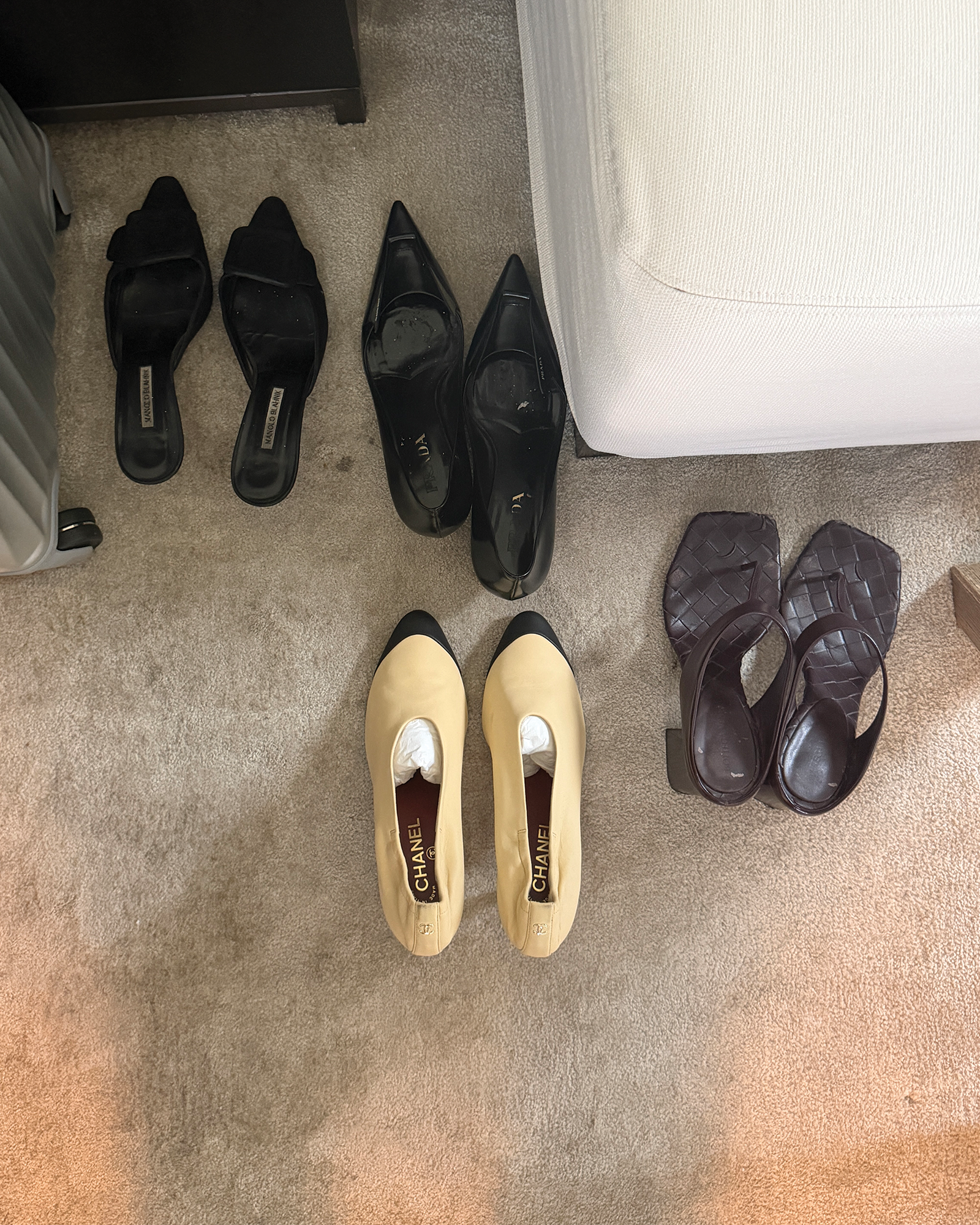 All the shoes Eliza Huber packed for New York Fashion Week, including footwear from Chanel, Bottega Veneta, Prada, and Manolo Blahnik.
