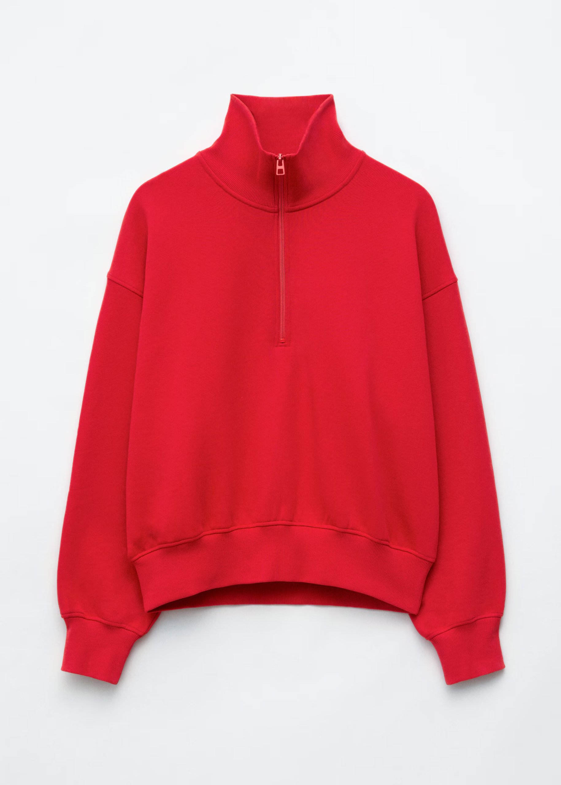 A red & Other Stories half-zip sweatshirt.
