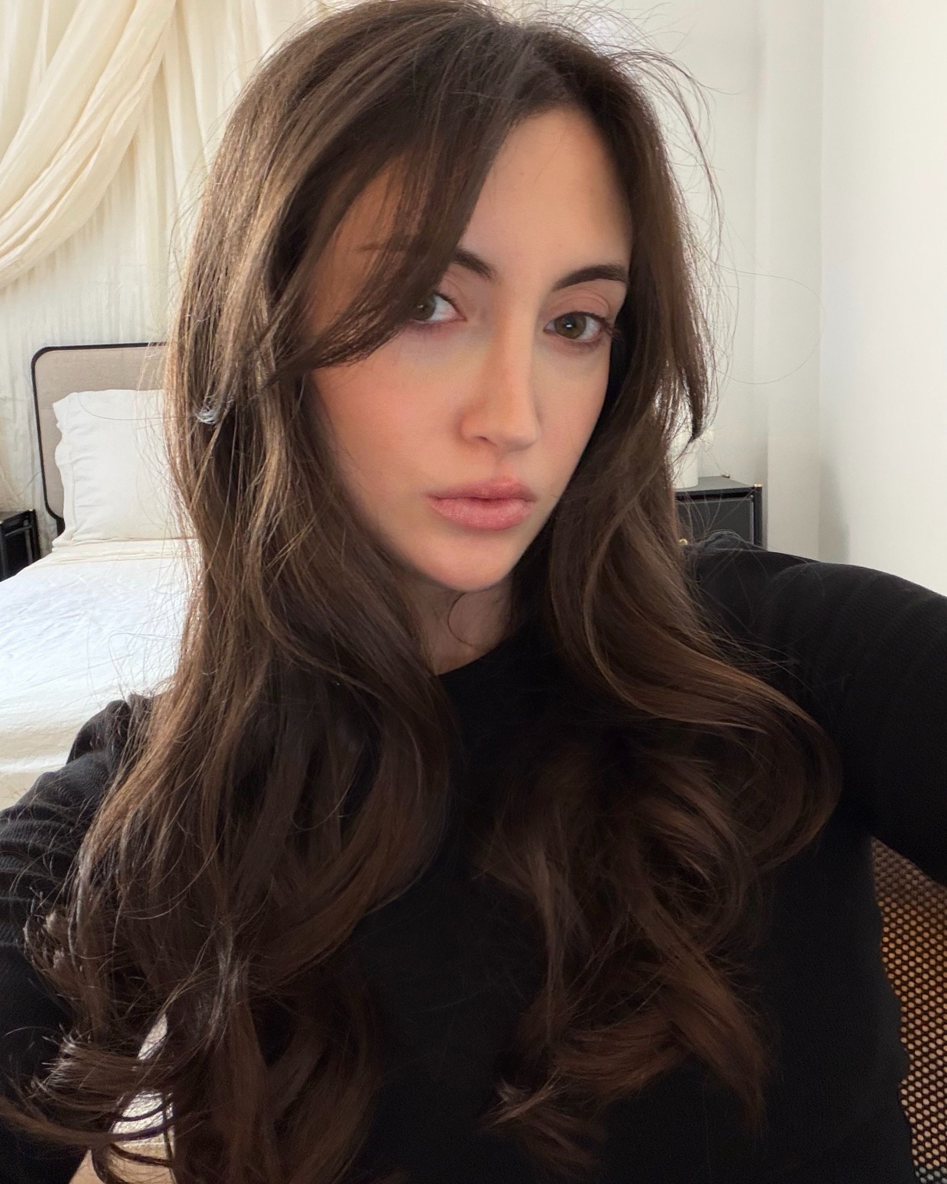 WWW associate beauty editor Alyssa Brascia's hair before cutting bangs like Daisy Edgar-Jones.