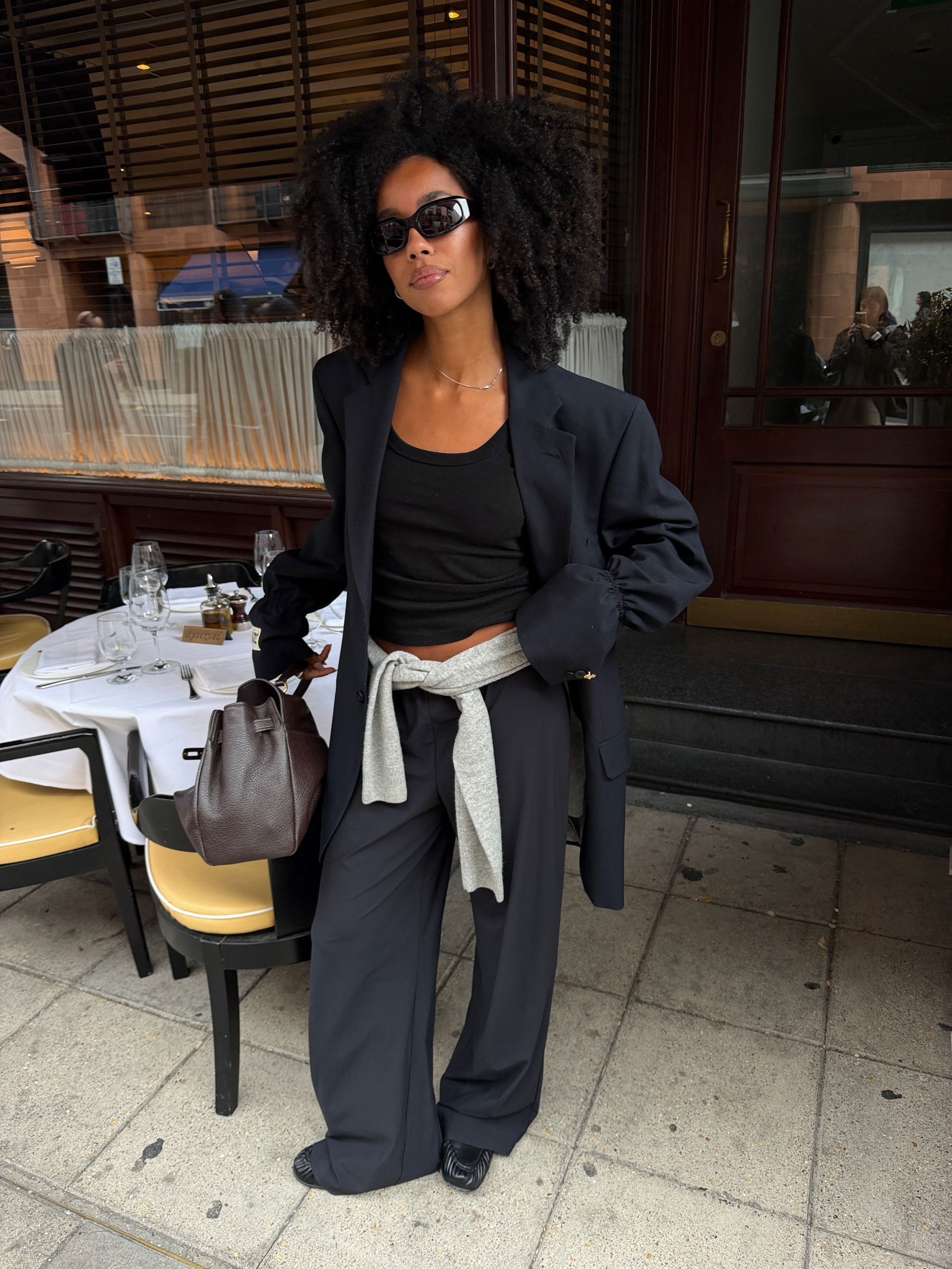 An image of a woman wearing put together fall outfit formula 2026