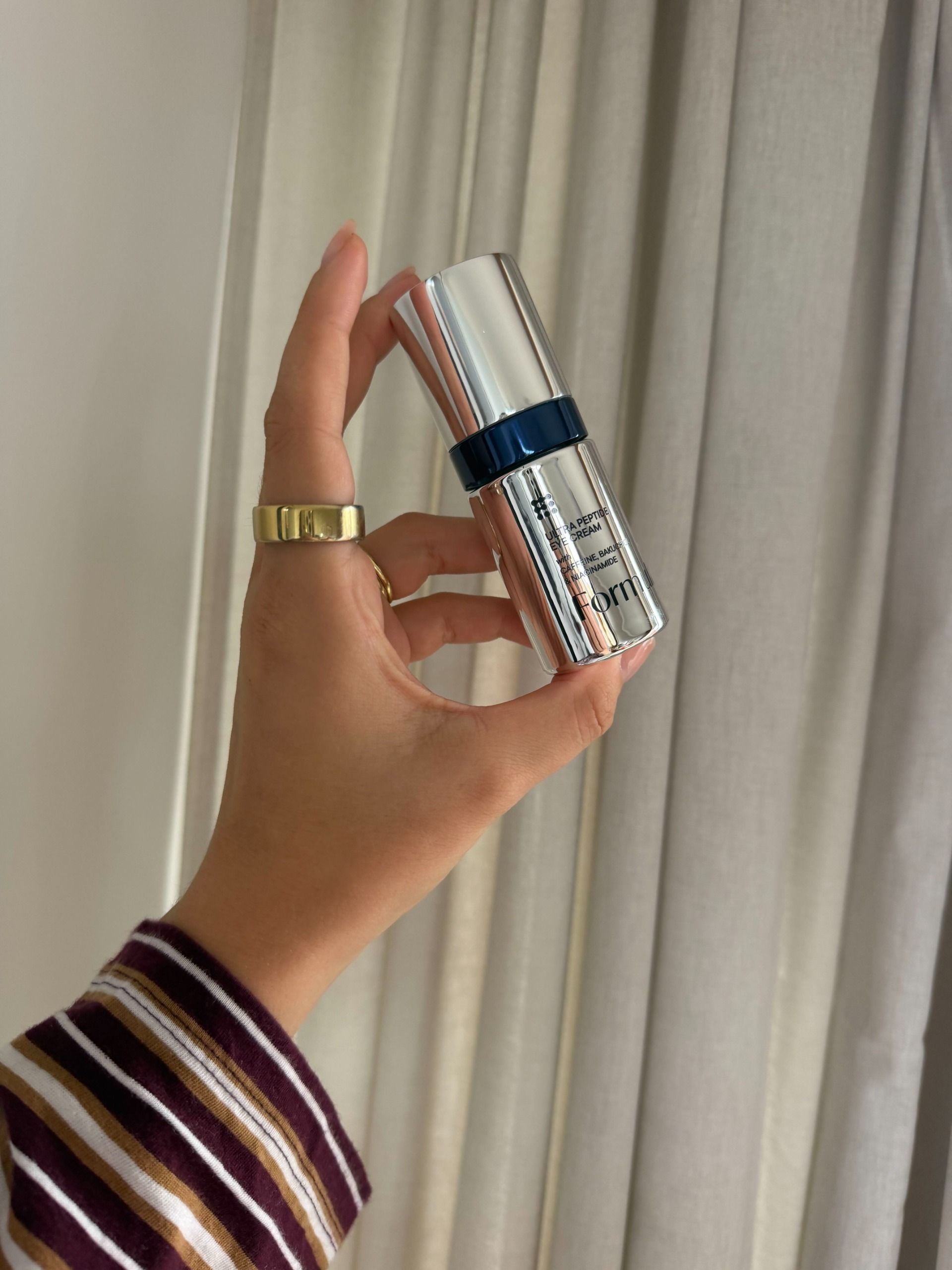 Shannon holding the M&S Formula Ultra Peptide eye cream