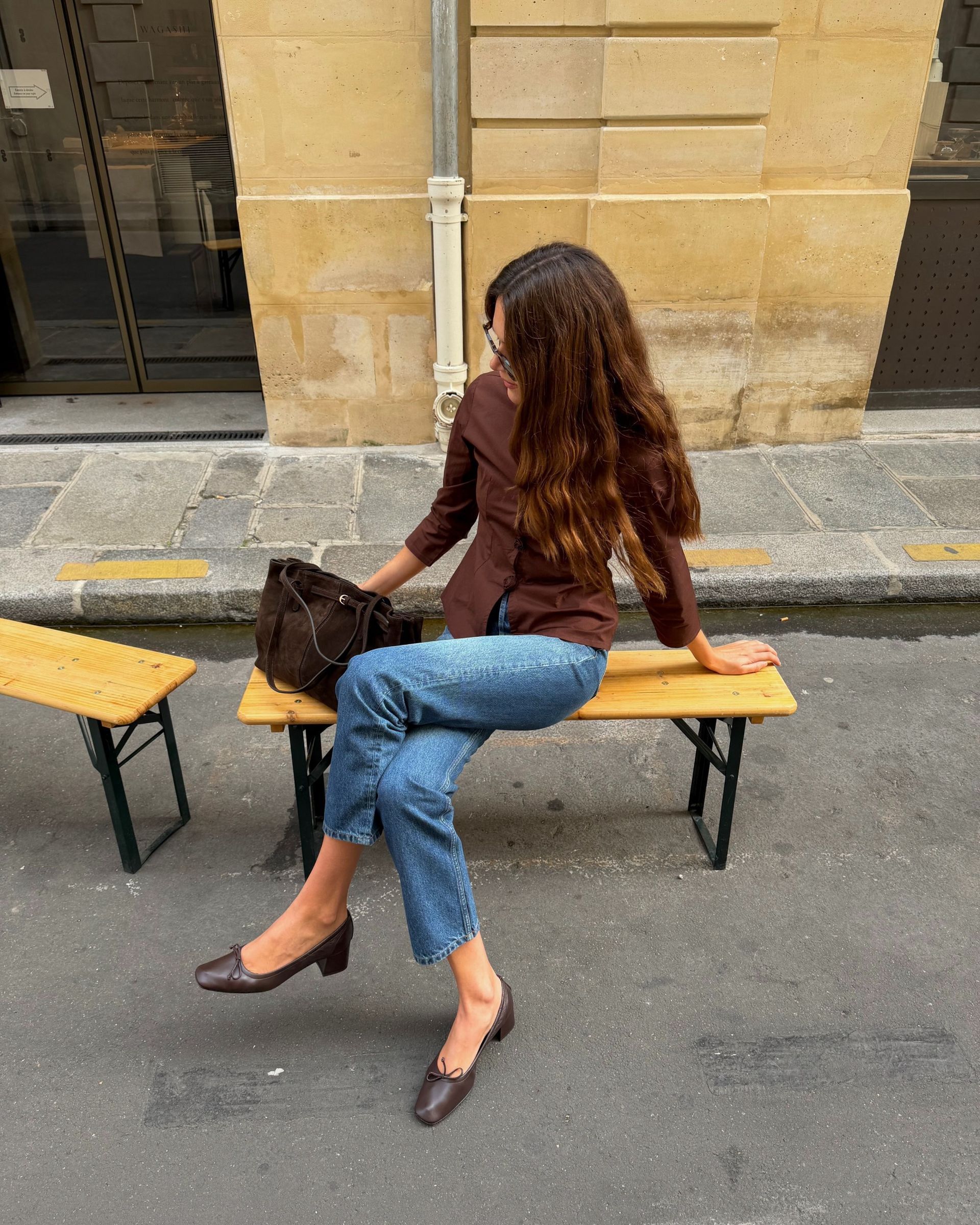 Woman in jeans and ballet pumps