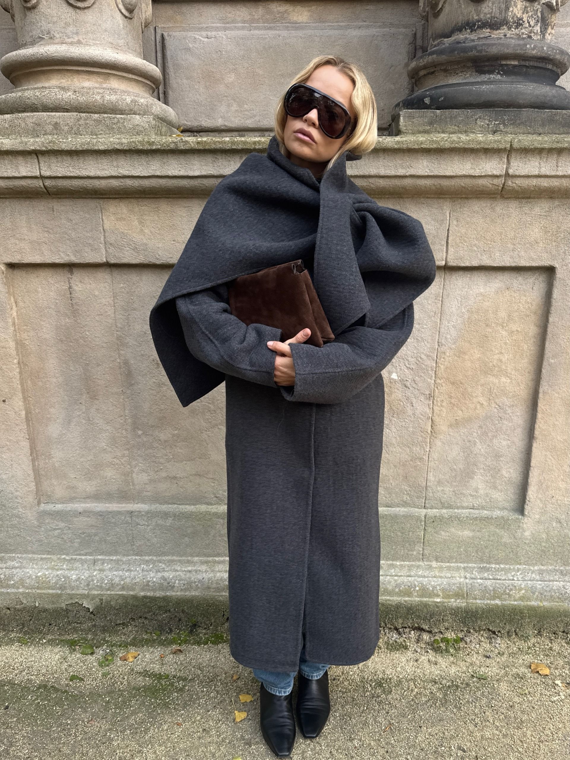 Stephanie Broek wearing a S&eacute;zane scarf coat.