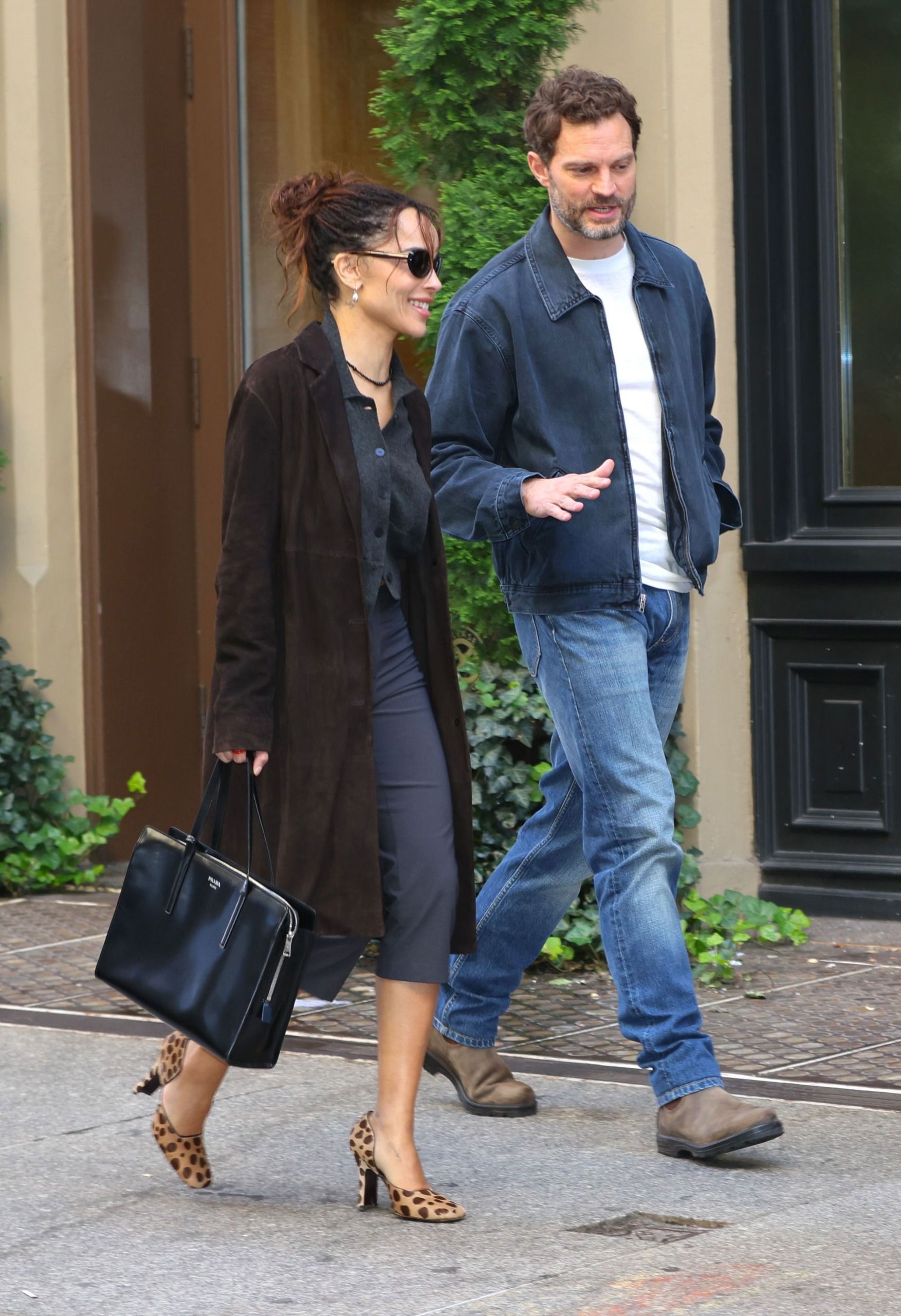 Zoe Kravitz wears capri pants with leopard-print heels with Jamie Dornan