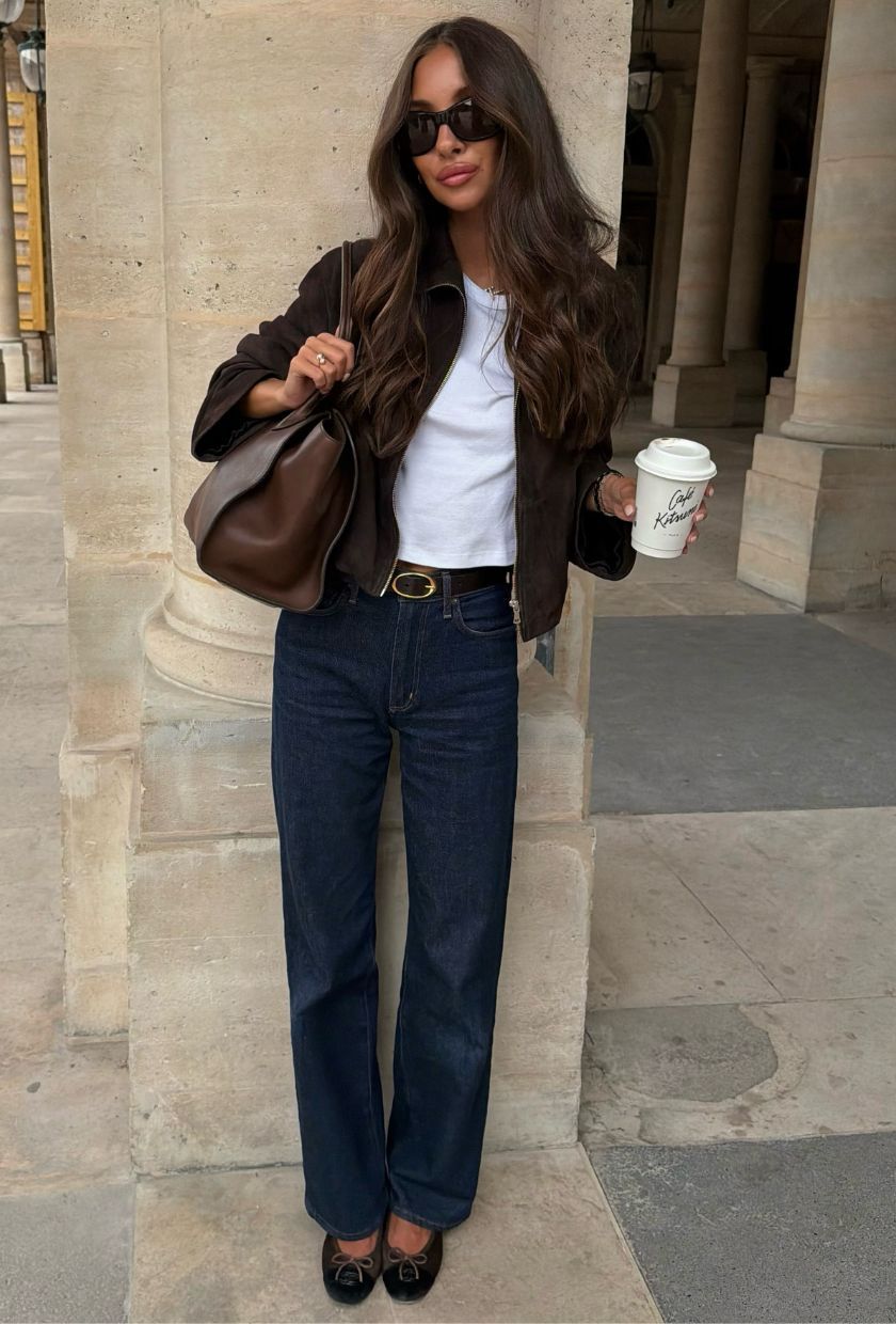 @fakerstrom wearing. brown suede jacket, white t-shirt, blue stovepipe jeans, black belt, brown ballet flats, bowling bag and sunglasses