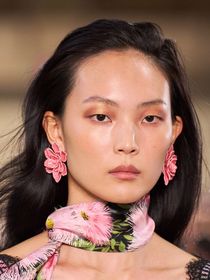 A close-up of a model on the runway of the Carolina Herrera S/S 27 show