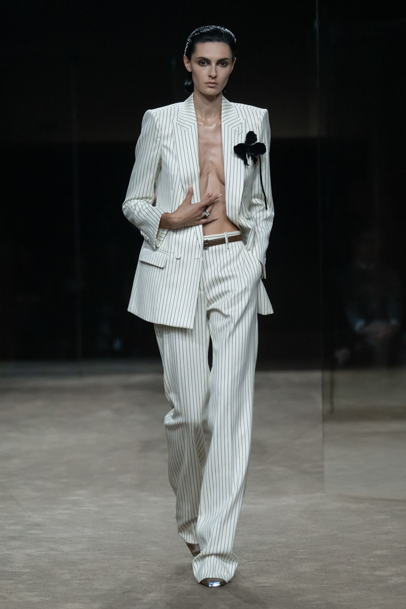 a model walks the tom ford runway show.