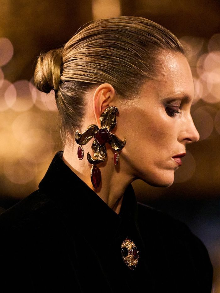 A close-up of the hair and makeup at the Saint Laurent S/S 27 show