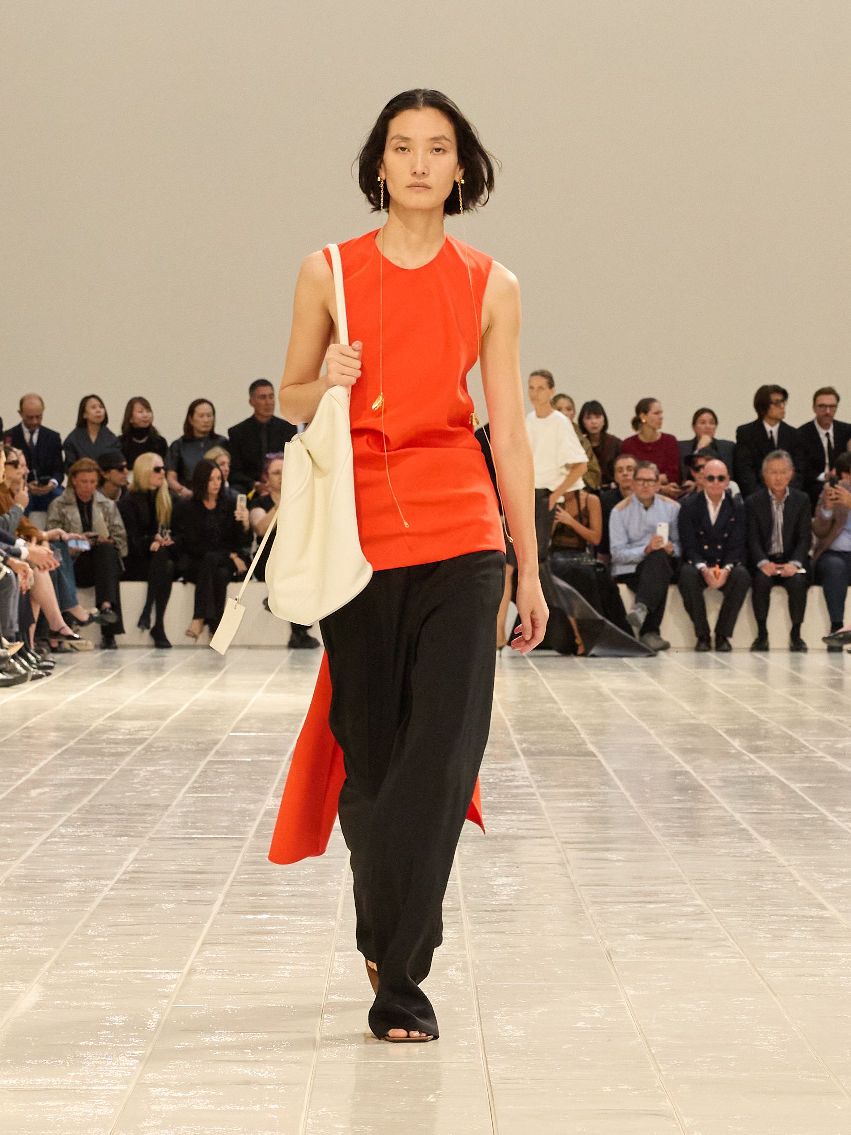 A model walking in the Balenciaga Summer 2027 show during Paris Fashion Week.