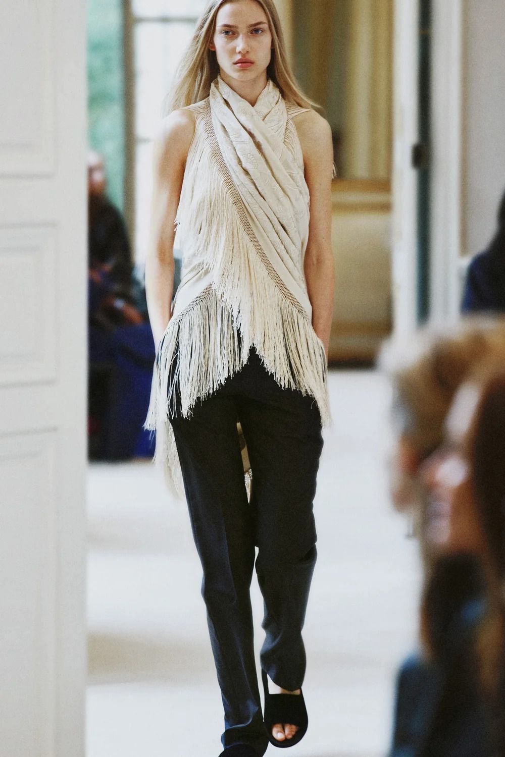 A model walking in The Row's Summer 2027 show during Paris Fashion Week.