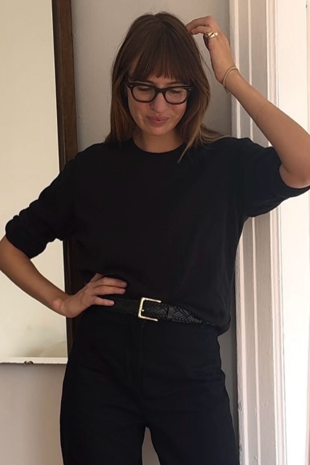 a close-up shot of a fringe styled with glasses
