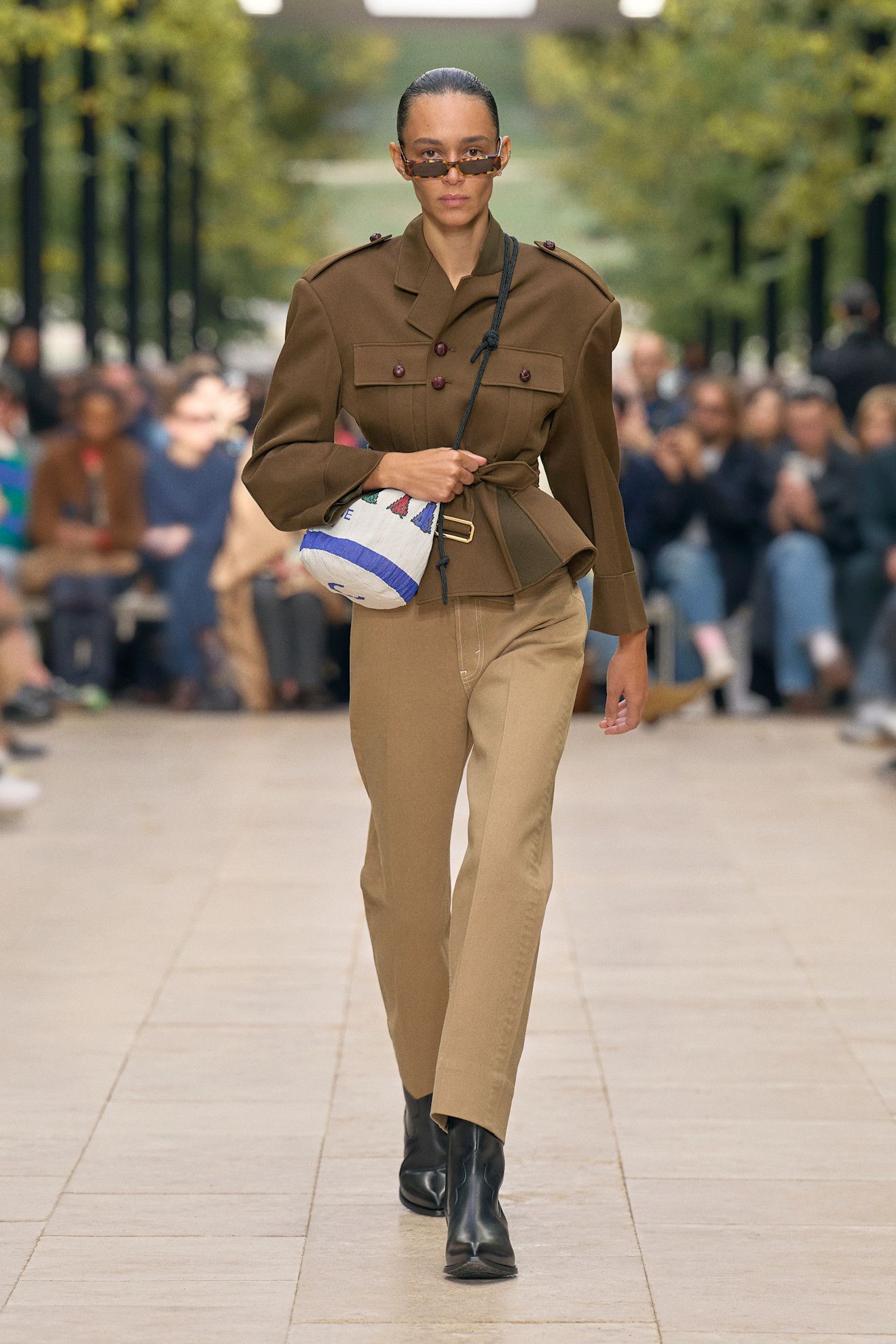 Celine spring/summer 2027 runway model wearing rain boots.