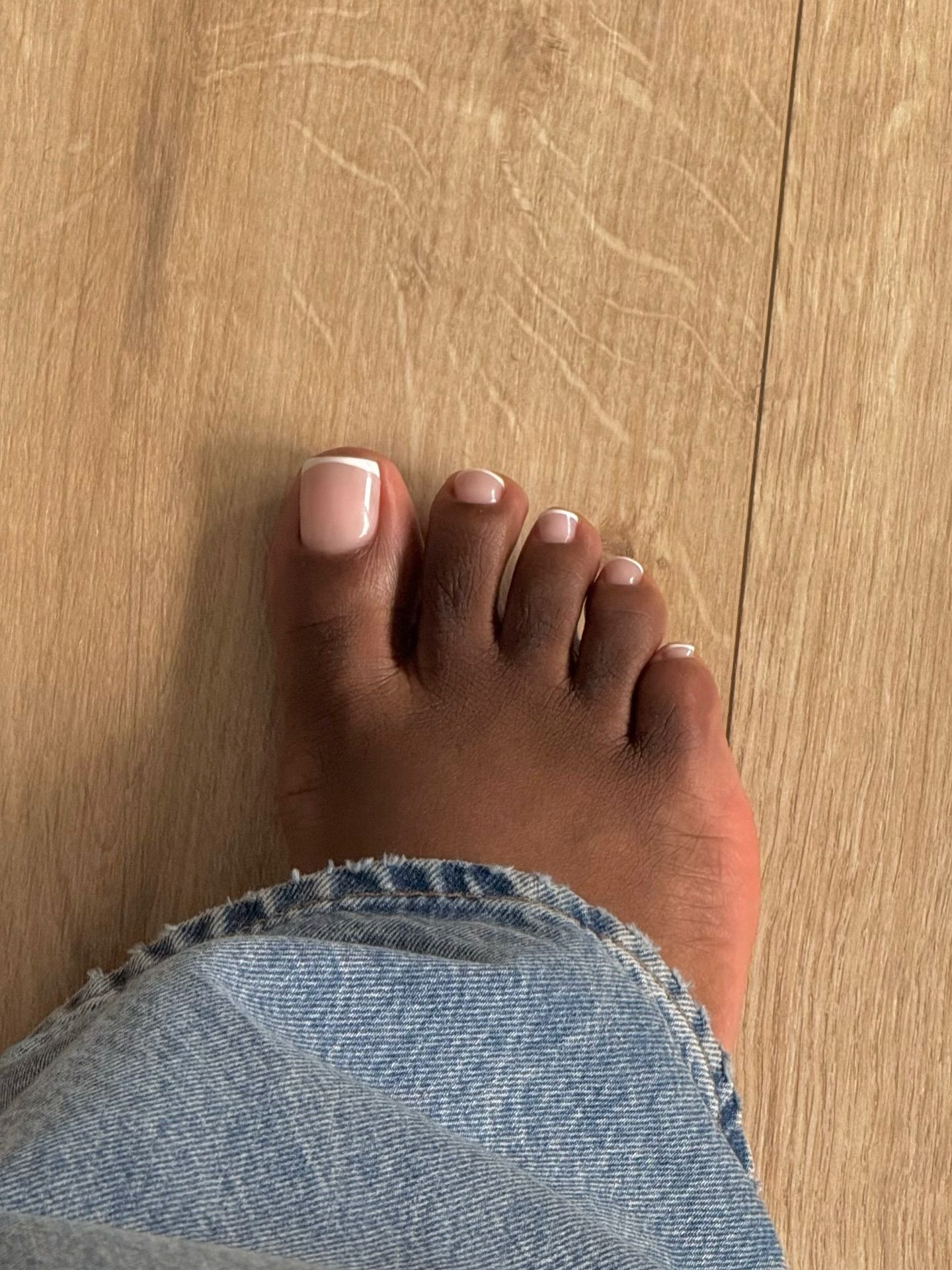 classic french pedicure worn with jeans - autumnal pedicures 2026