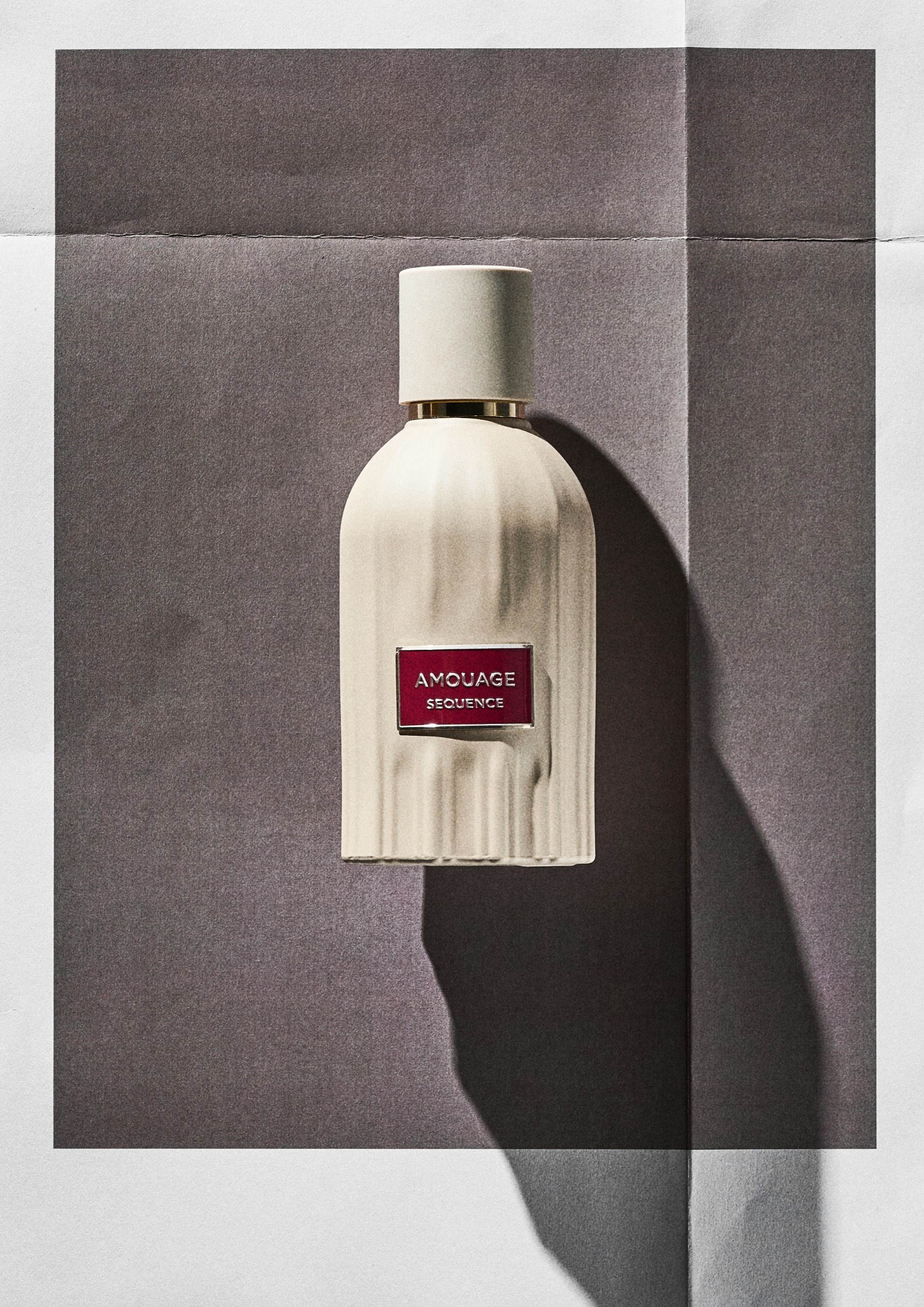 Amouage Sequence on a grey background