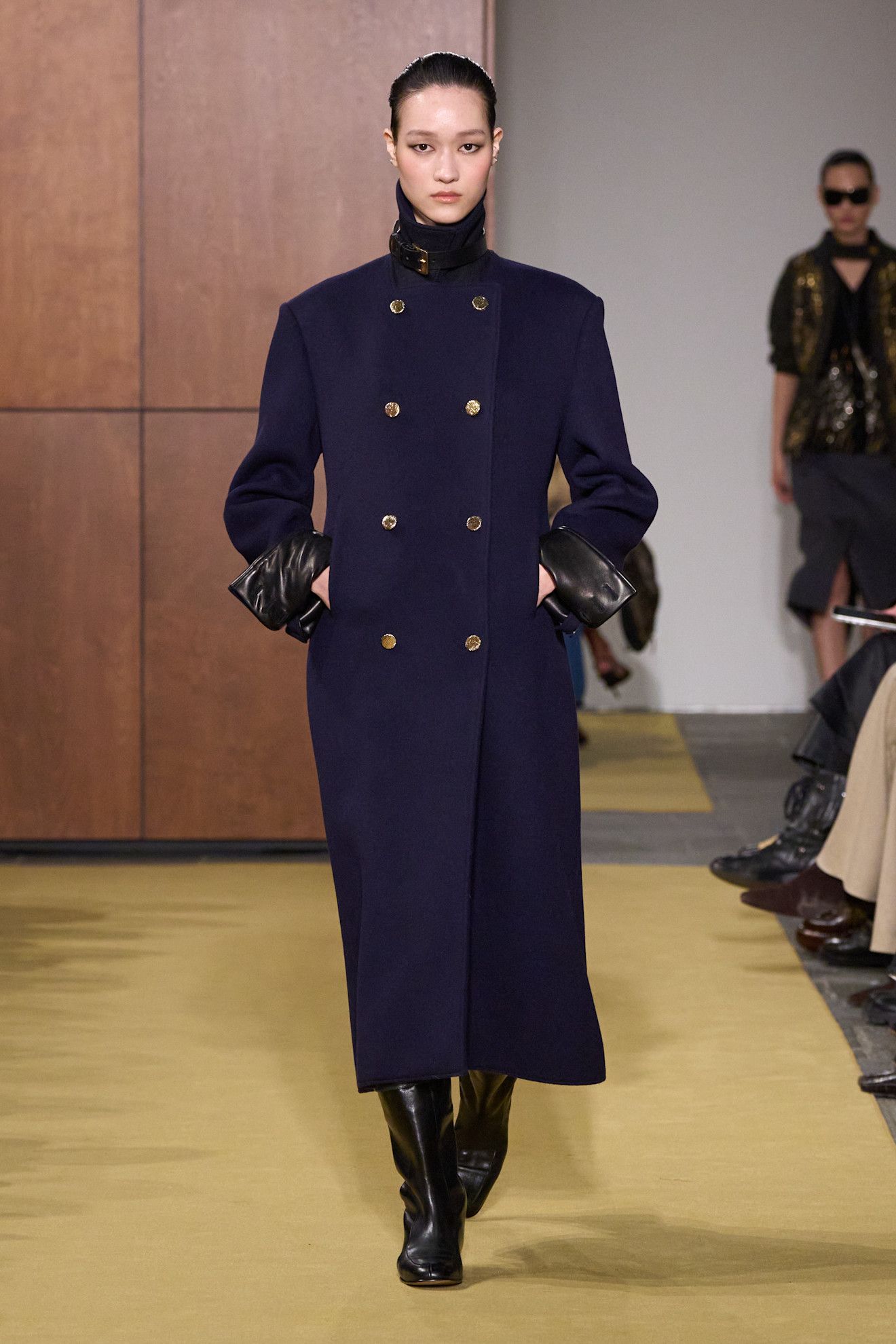 Model walking on a fall/winter 2026 runway.