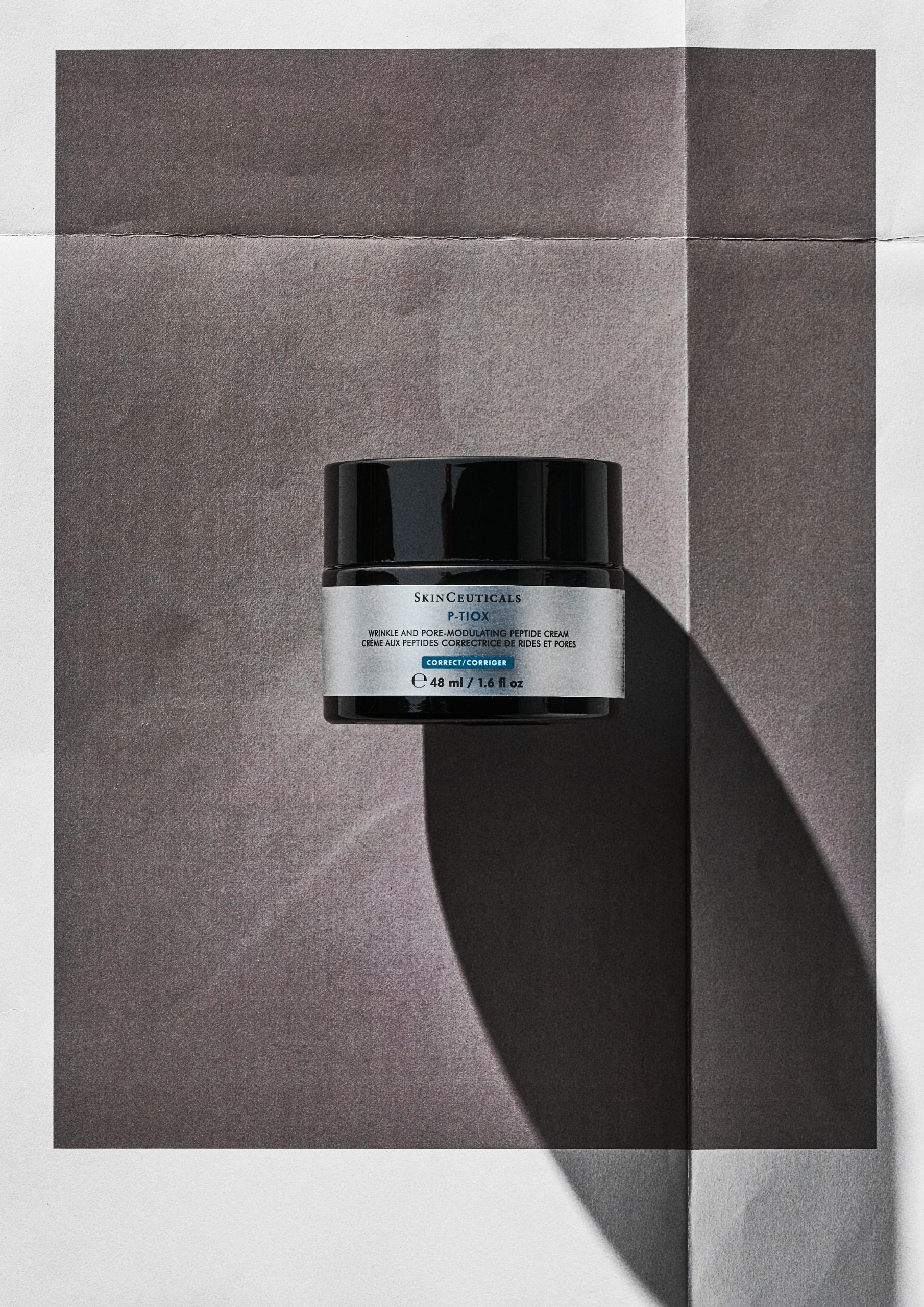 SkinCeuticals P-Tiox Cream on a grey background