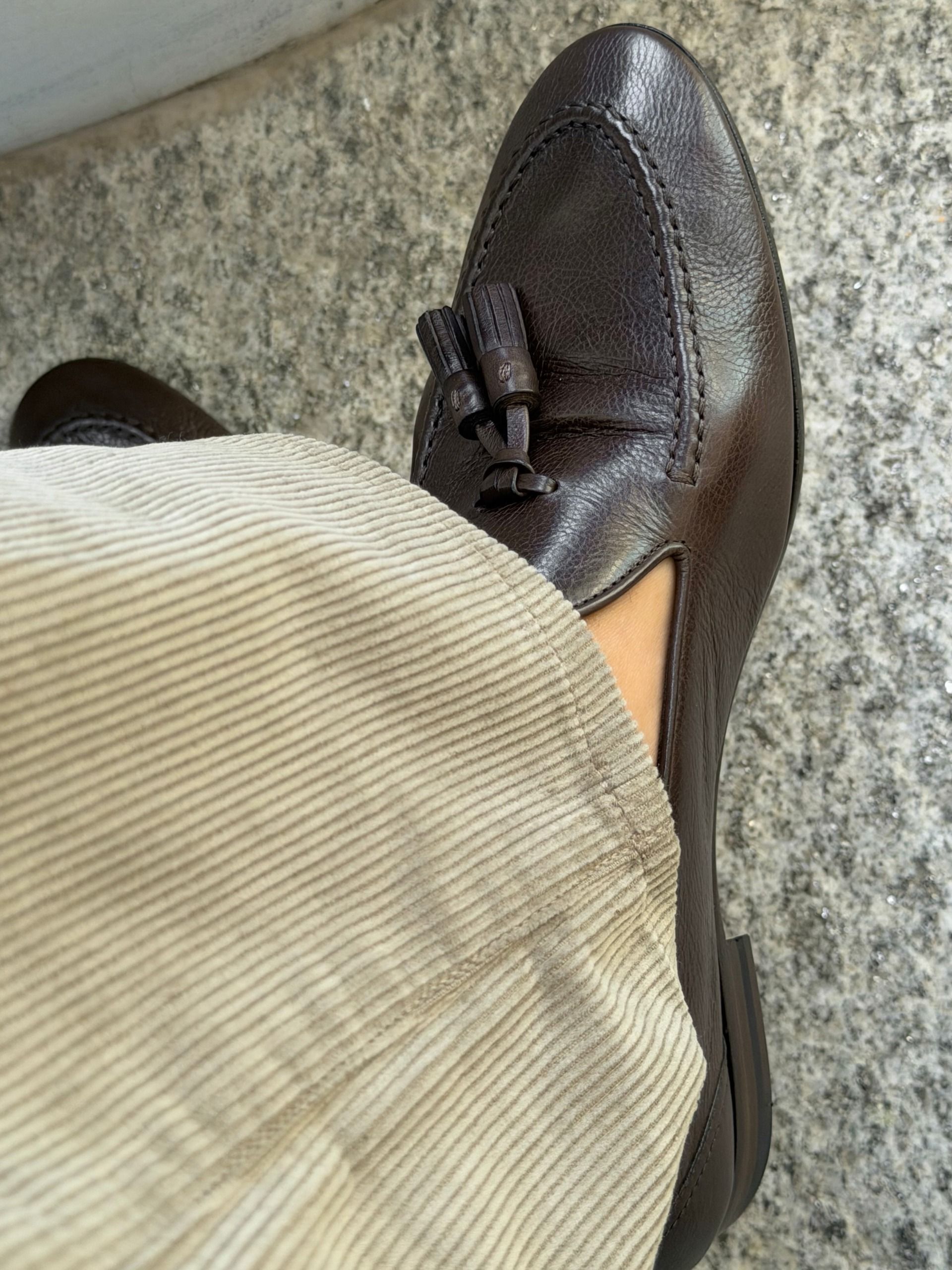 An image of @josefinehj wearing moccasins with corduroy trousers.