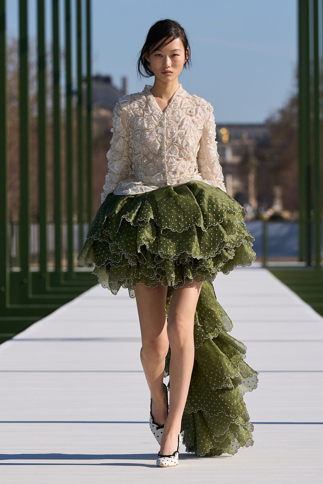 Dior model wearing a fall 2026 runway look.