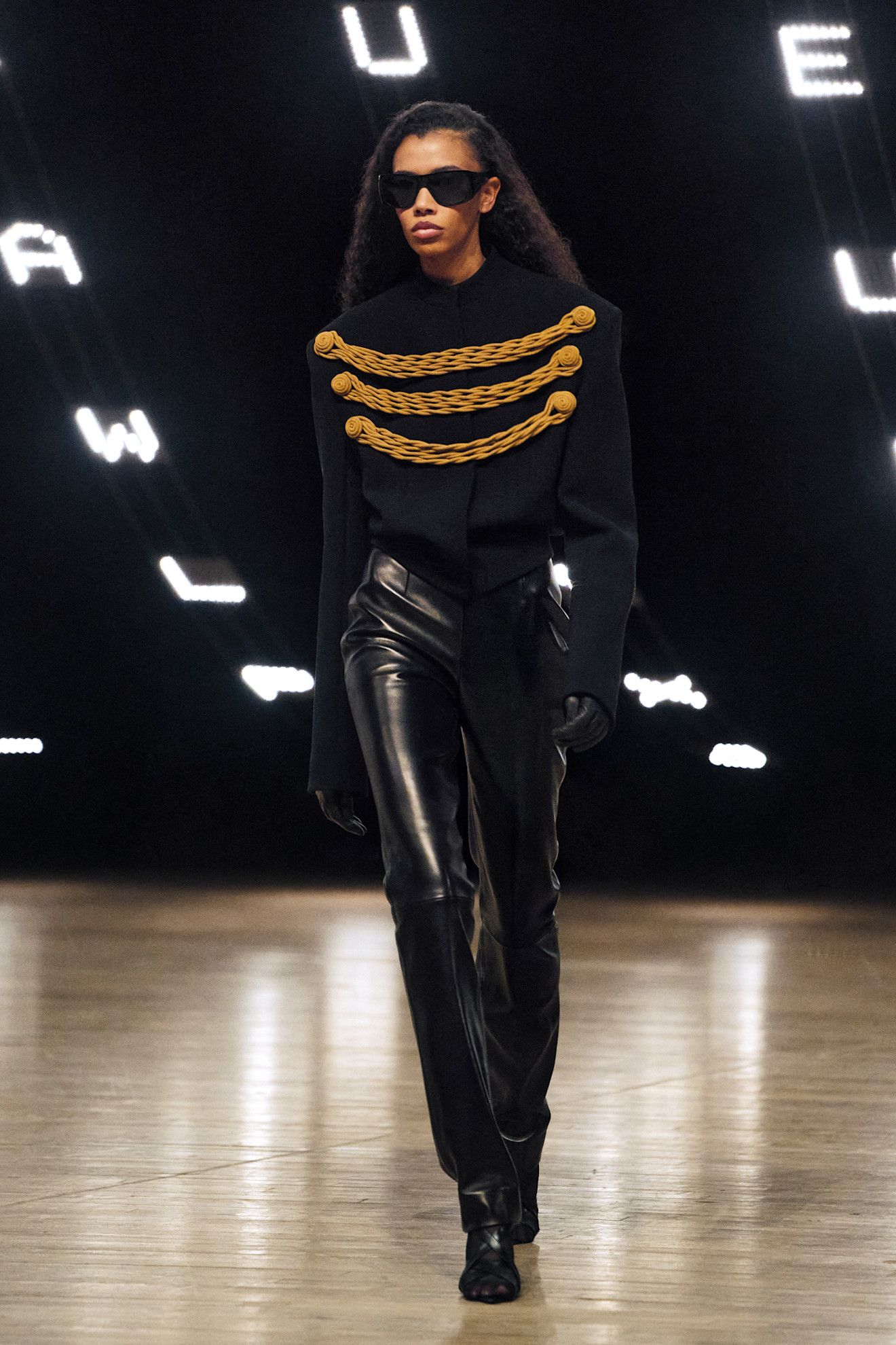 Khaite model wearing a fall 2026 runway look.