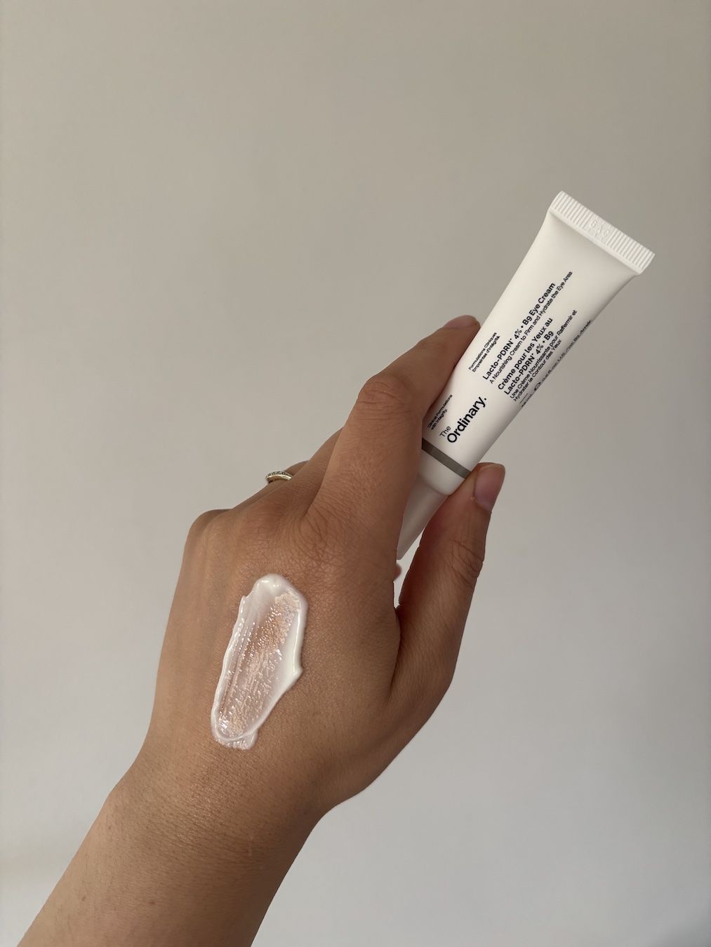 Mica Ricketts swatching The Ordinary Lacto-PDRN 4% + B9 Eye Cream