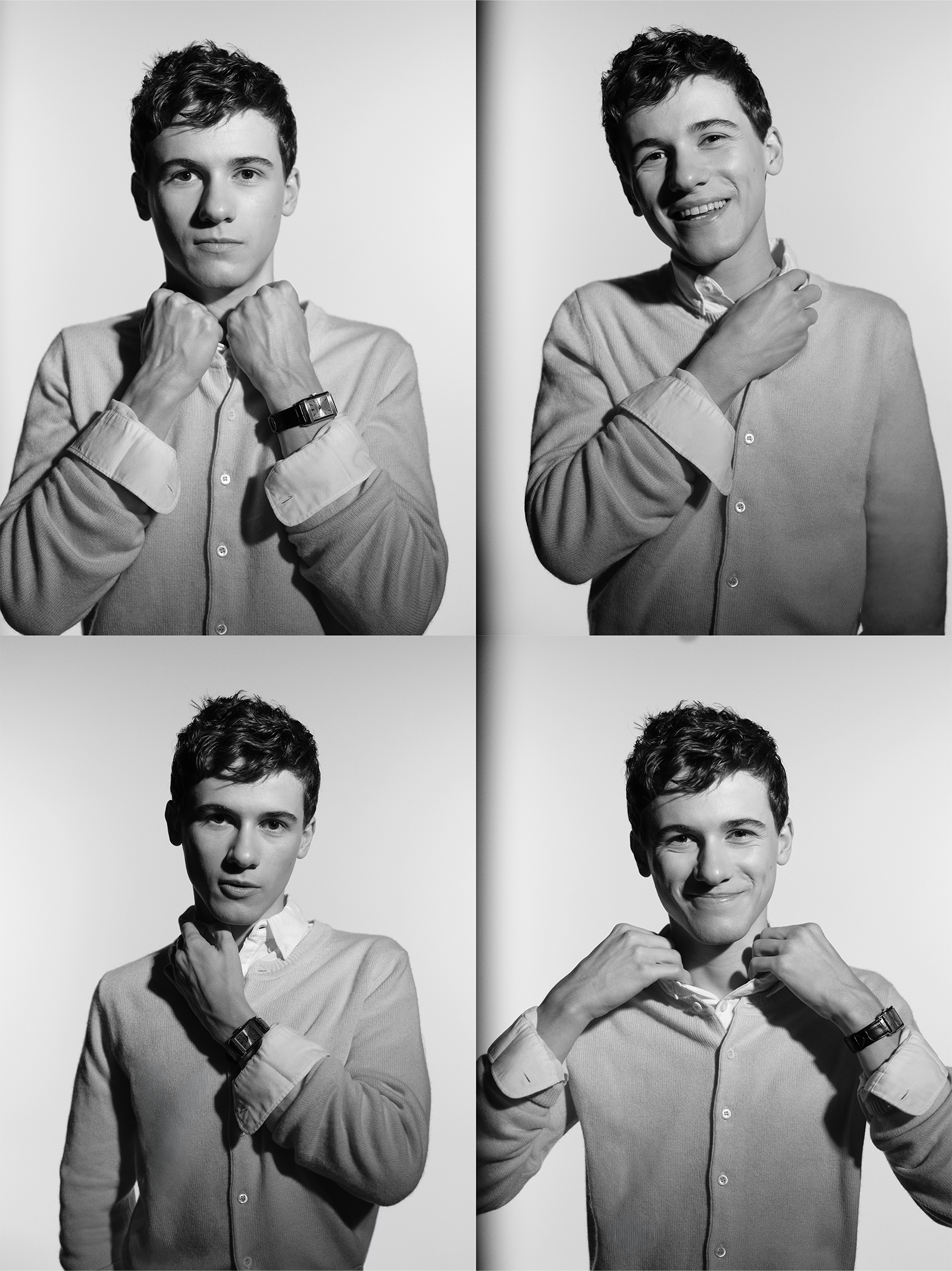 Actor Sam Nivola, photographed by JJ Geiger for Who What Wear. He is wearing a white button-down shirt and khaki trousers with a yellow cardigan.