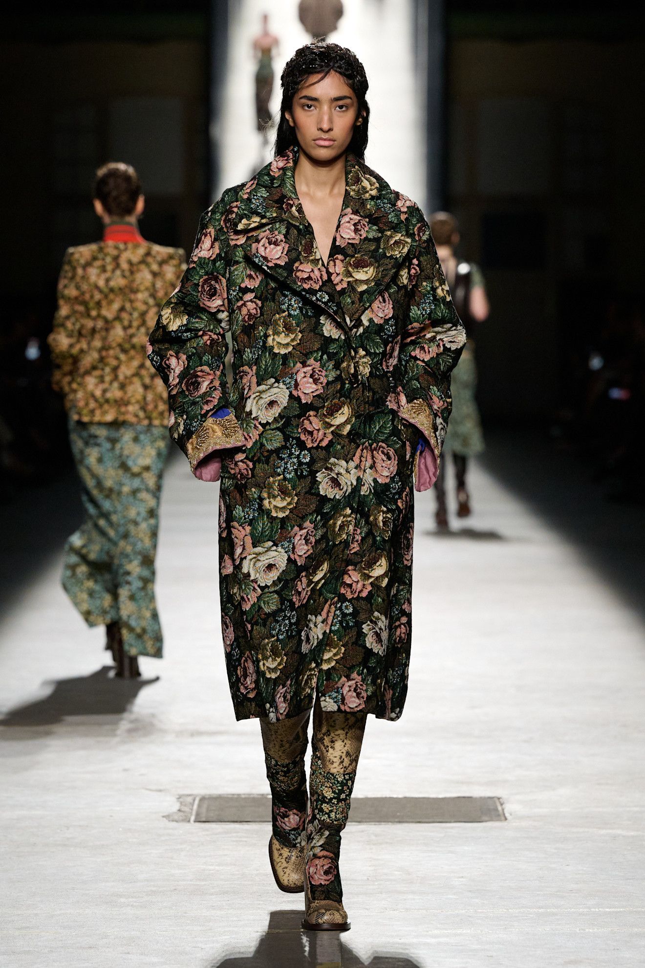 Dries Van Noten fall/winter 2026 model wearing moody floral-print clothing.