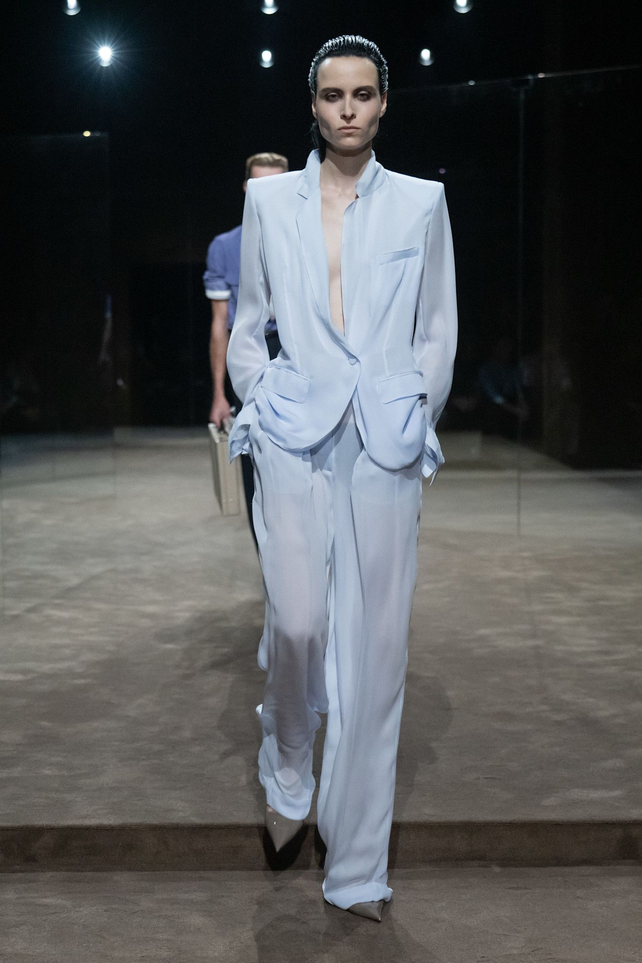 a model walks the tom ford runway show.