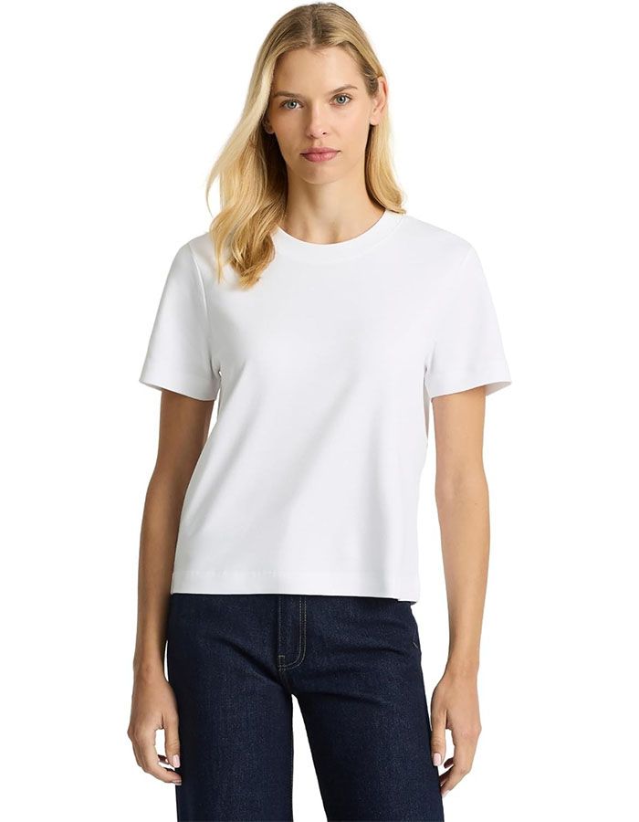 Woman in a white tee