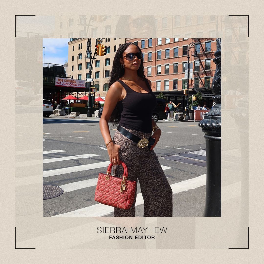 Sierra wearing a red Dior bag and cheetah pants.