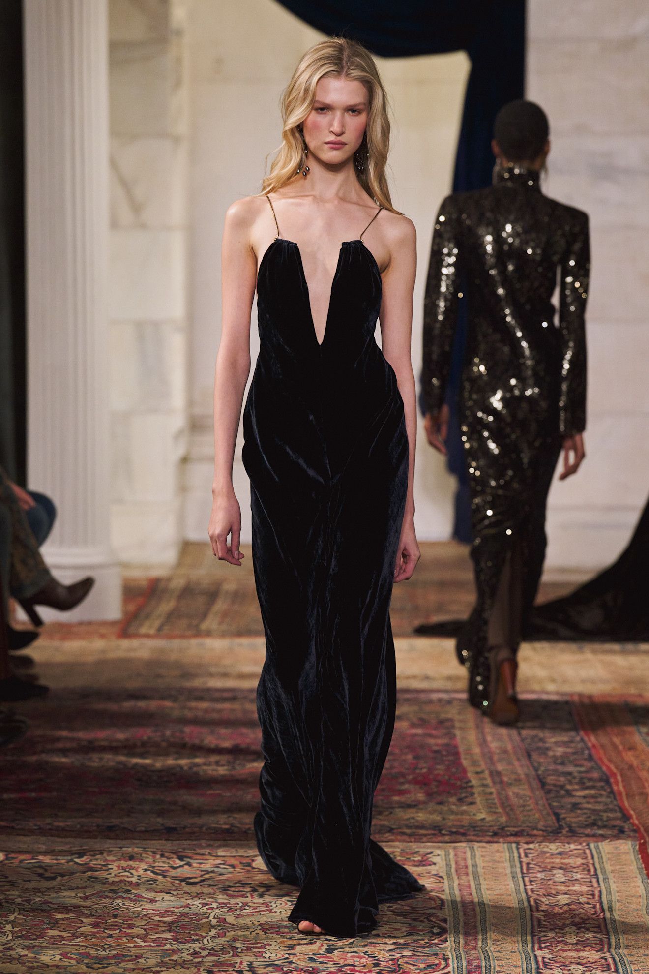 Model walking on a fall/winter 2026 runway.