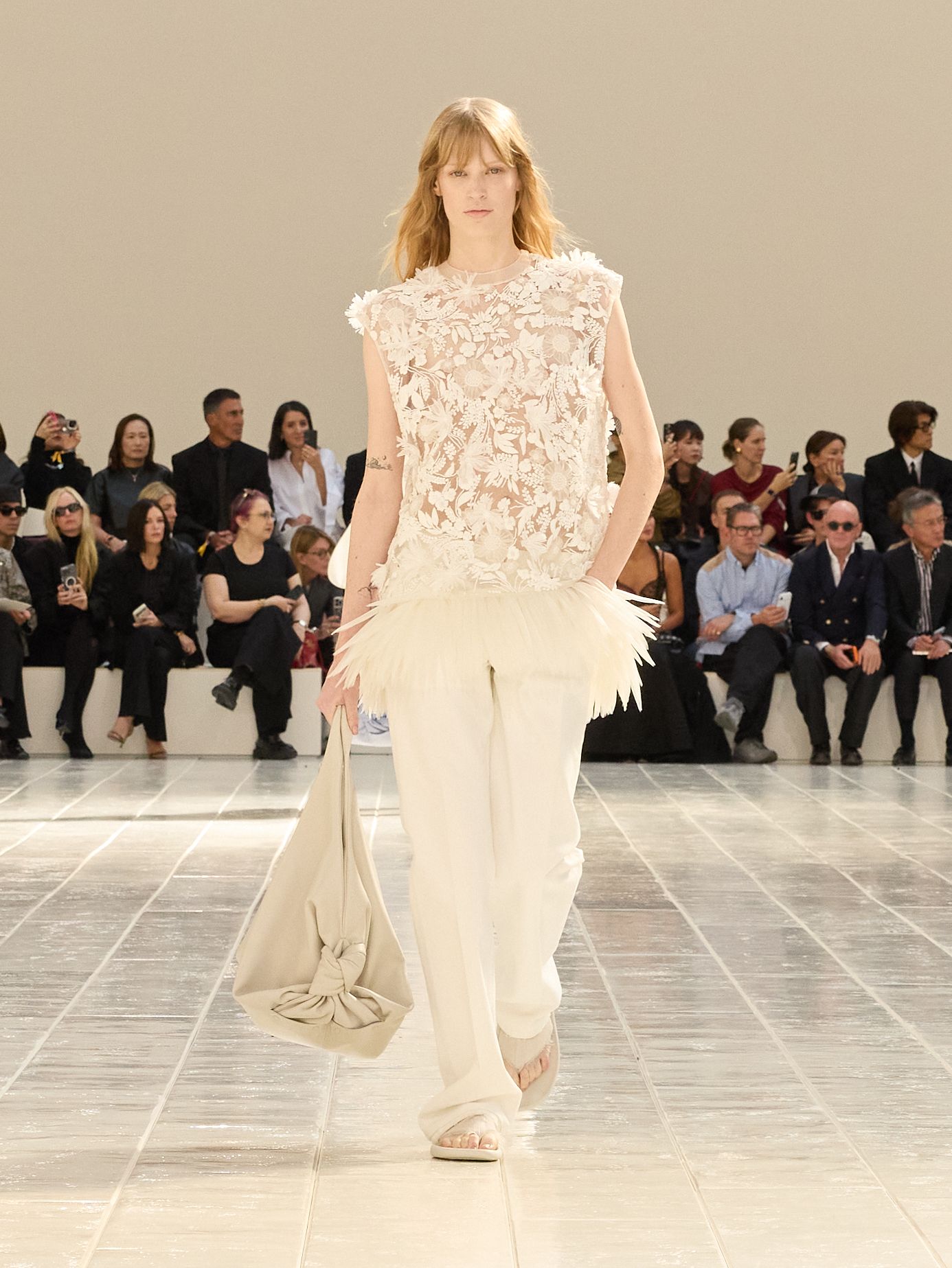 A model walking in the Balenciaga Summer 2027 show during Paris Fashion Week.