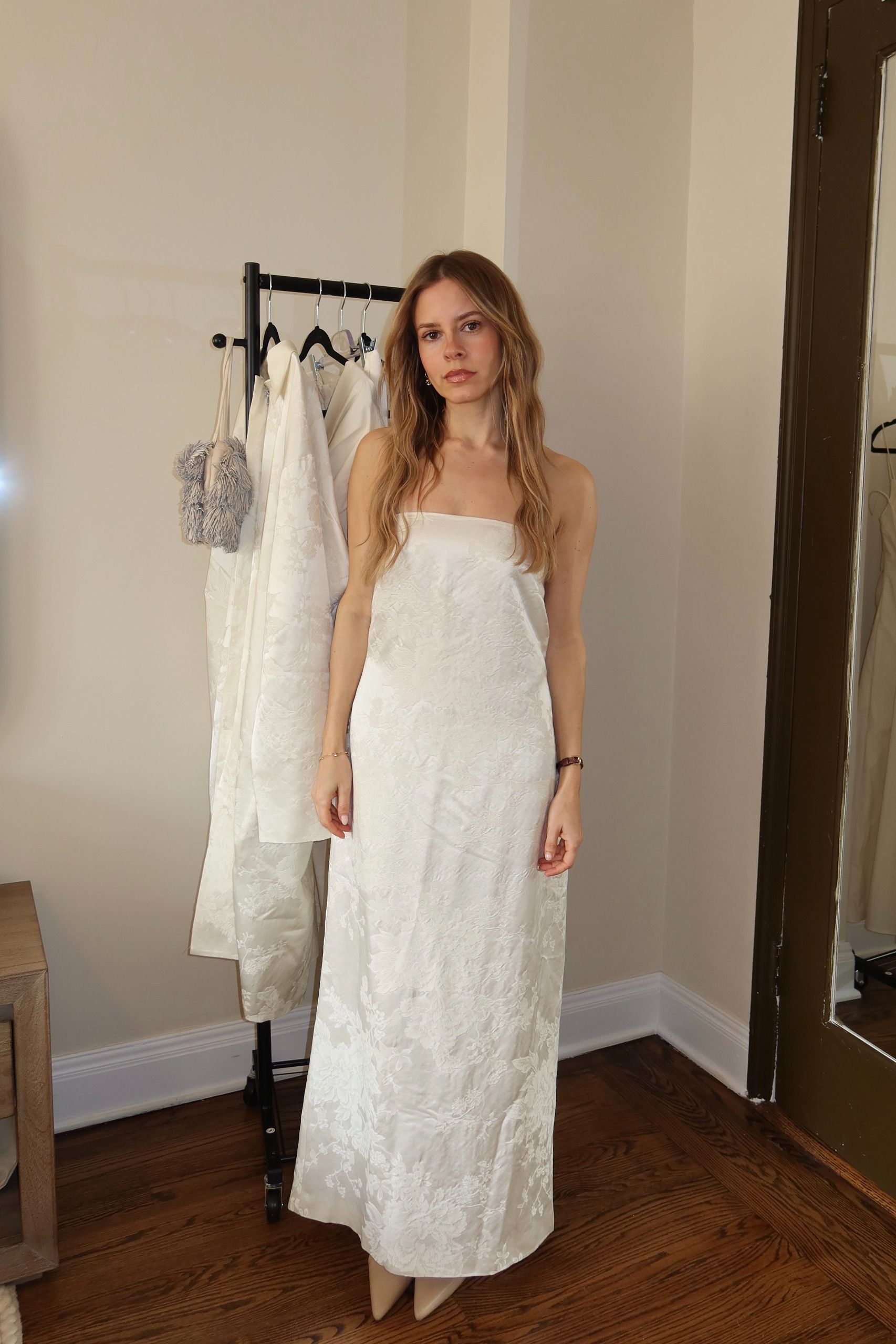 nikki tries on a dress from the st. agni bridal edit.