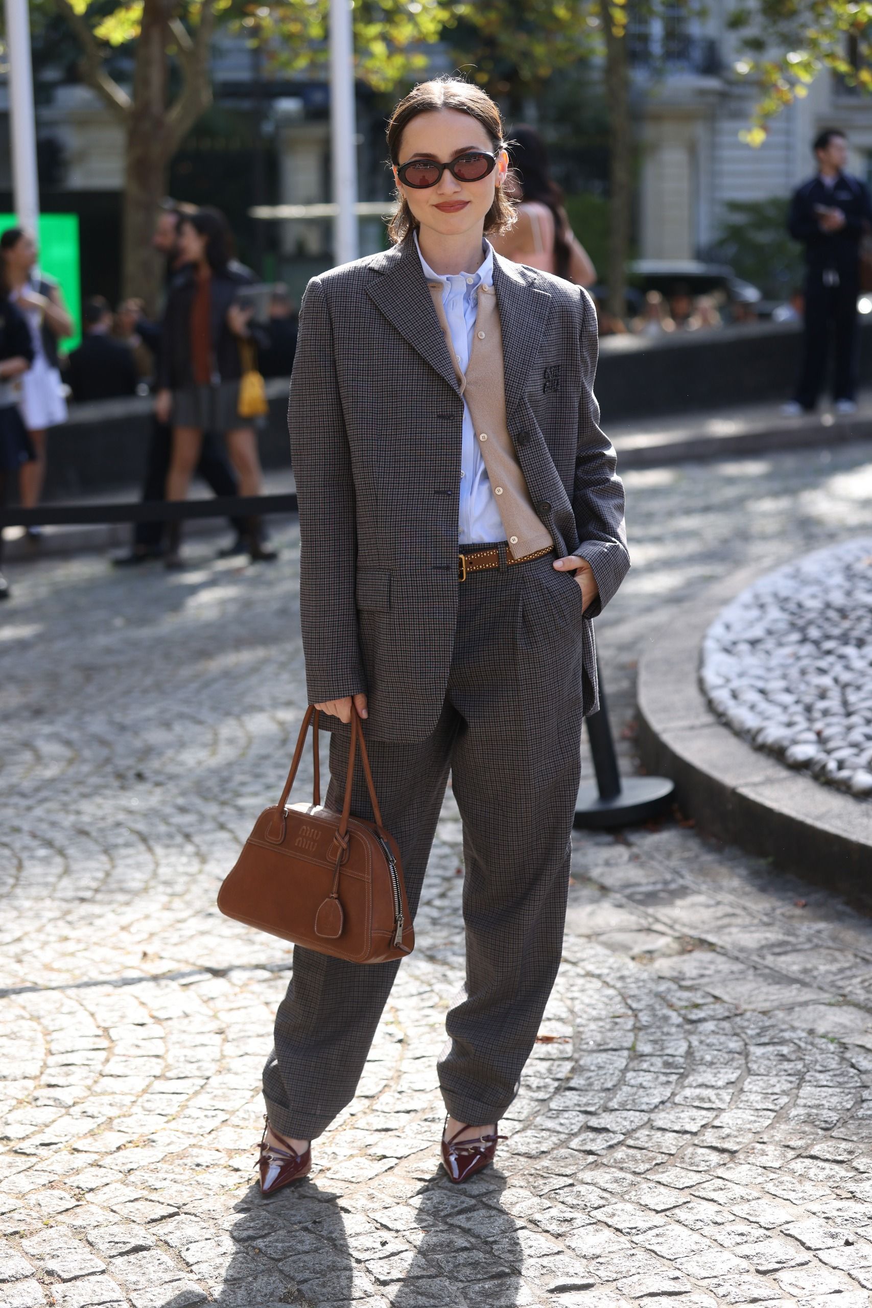 Maude Apatow at the Miu Miu fashion show as part of Paris RTW Spring/Summer 2027 fashion week held at Palais de Iena on October 04, 2026 in Paris, France.
