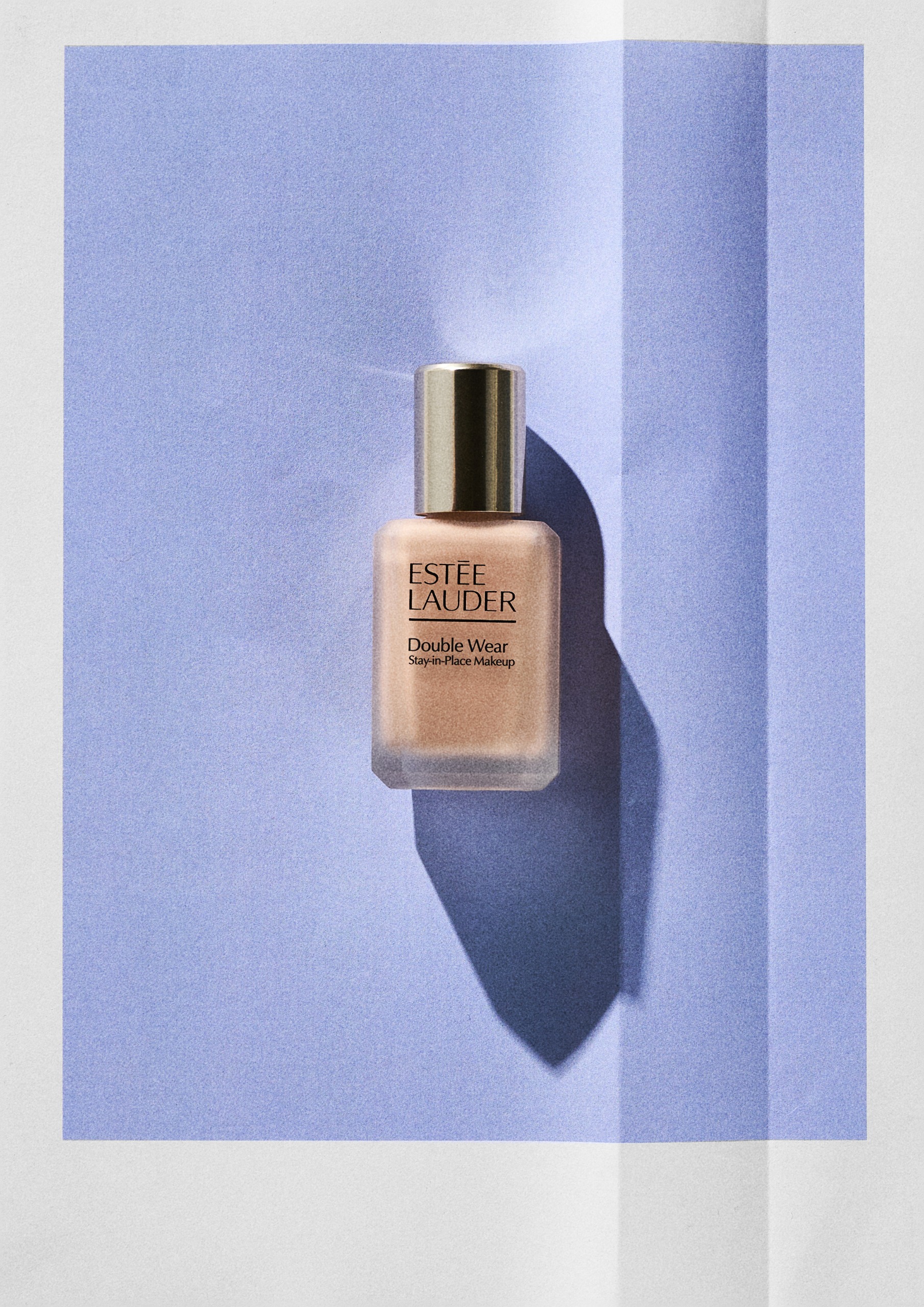 Esteé Lauder Double Wear Stay-in-Place Foundation on a blue background