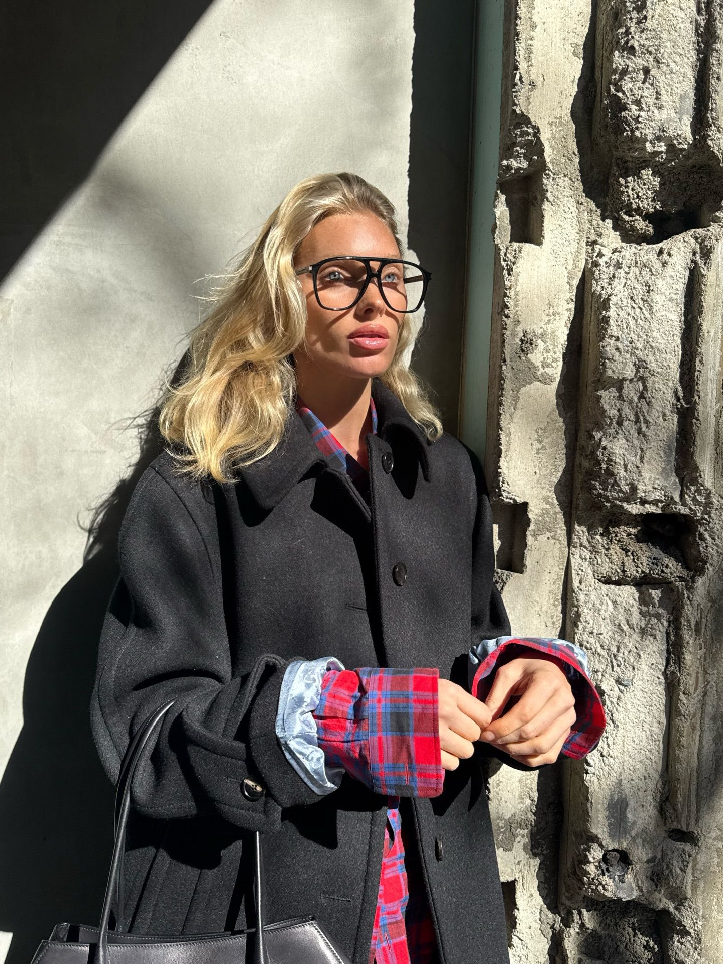 a close-up shot of medium-length hair styled with glasses